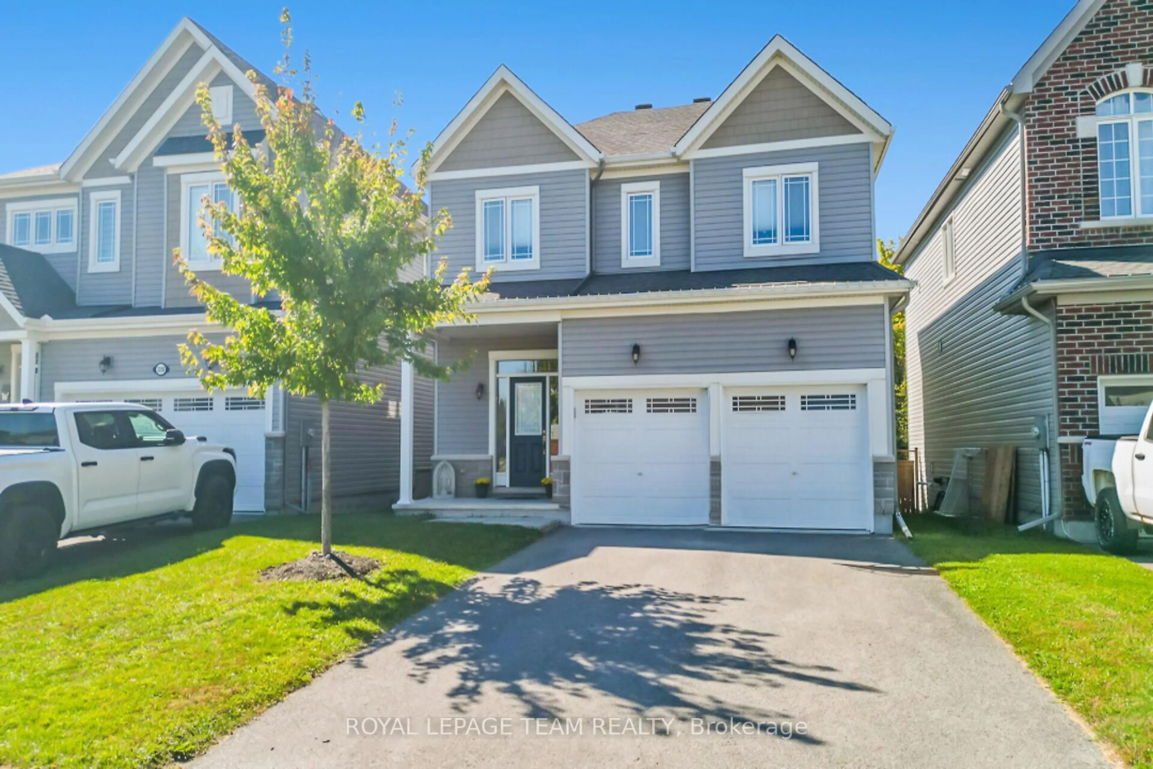 Home with vinyl exterior material, street for 3202 Harvester Cres, North Grenville Ontario K0G 1J0