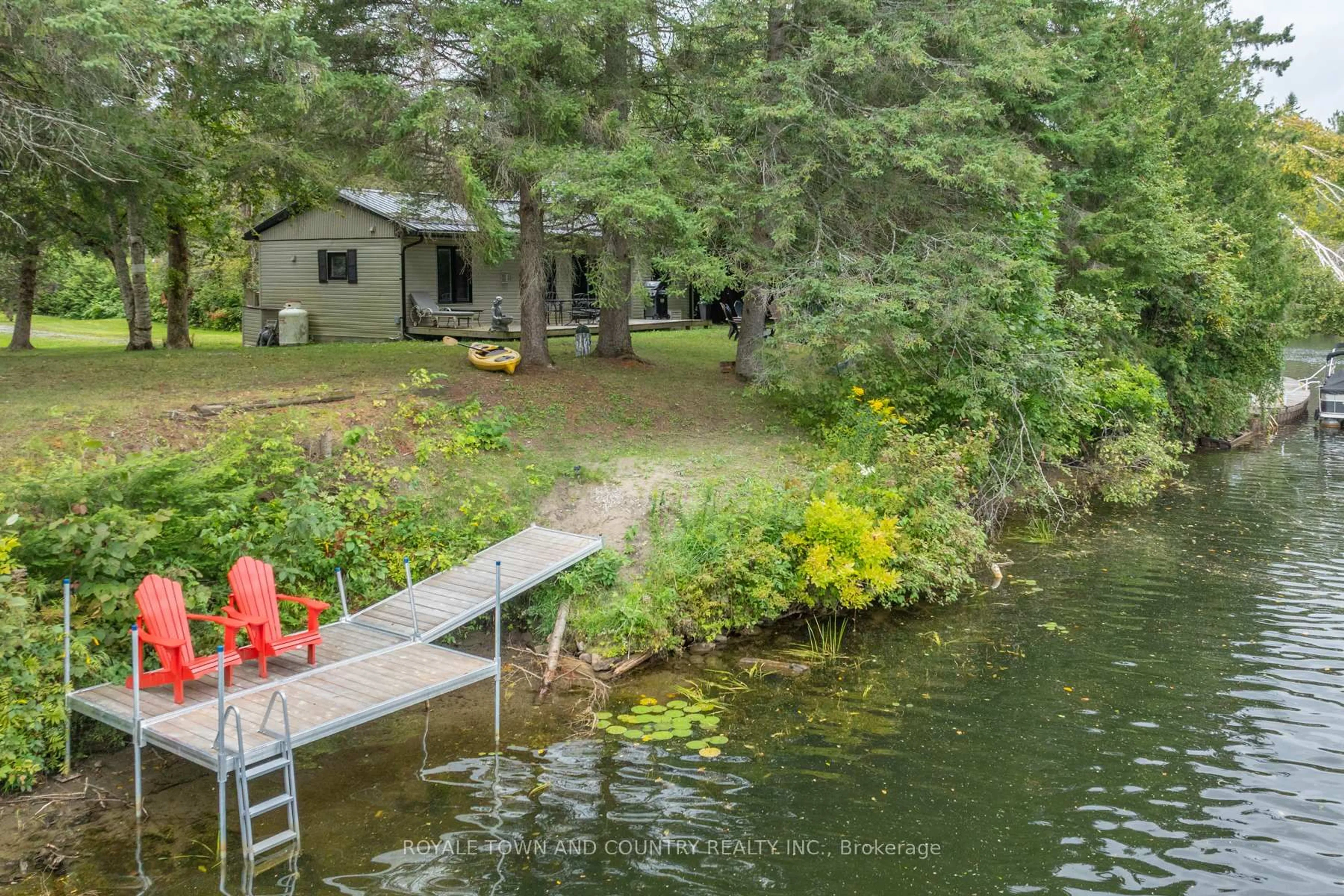 A pic from outside/outdoor area/front of a property/back of a property/a pic from drone, water/lake/river/ocean view for 82 Riverbank Rd, Kawartha Lakes Ontario K0M 1N0
