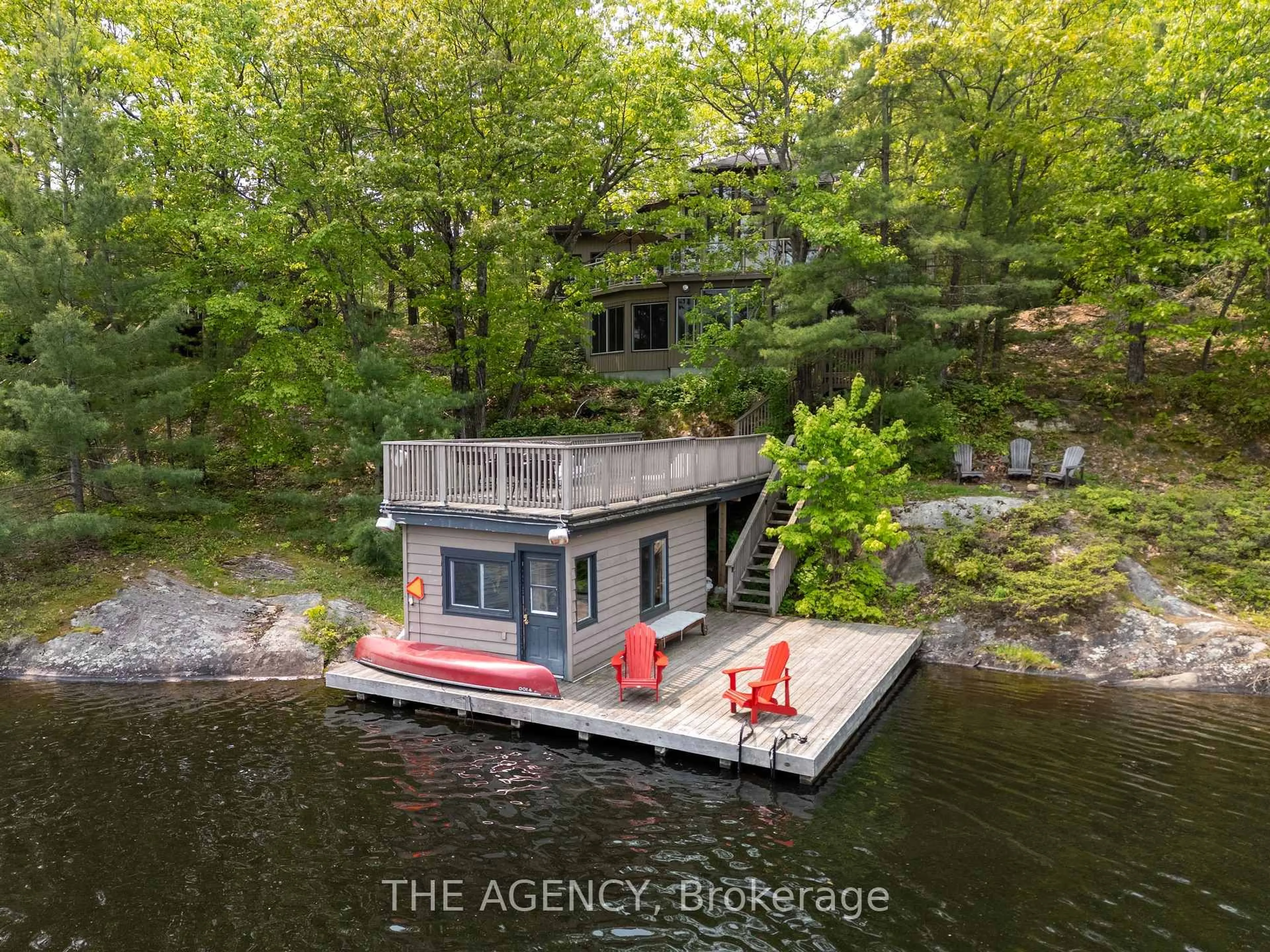 A pic from outside/outdoor area/front of a property/back of a property/a pic from drone, water/lake/river/ocean view for 45 Pinetree Rd, Gravenhurst Ontario P1P 1R2