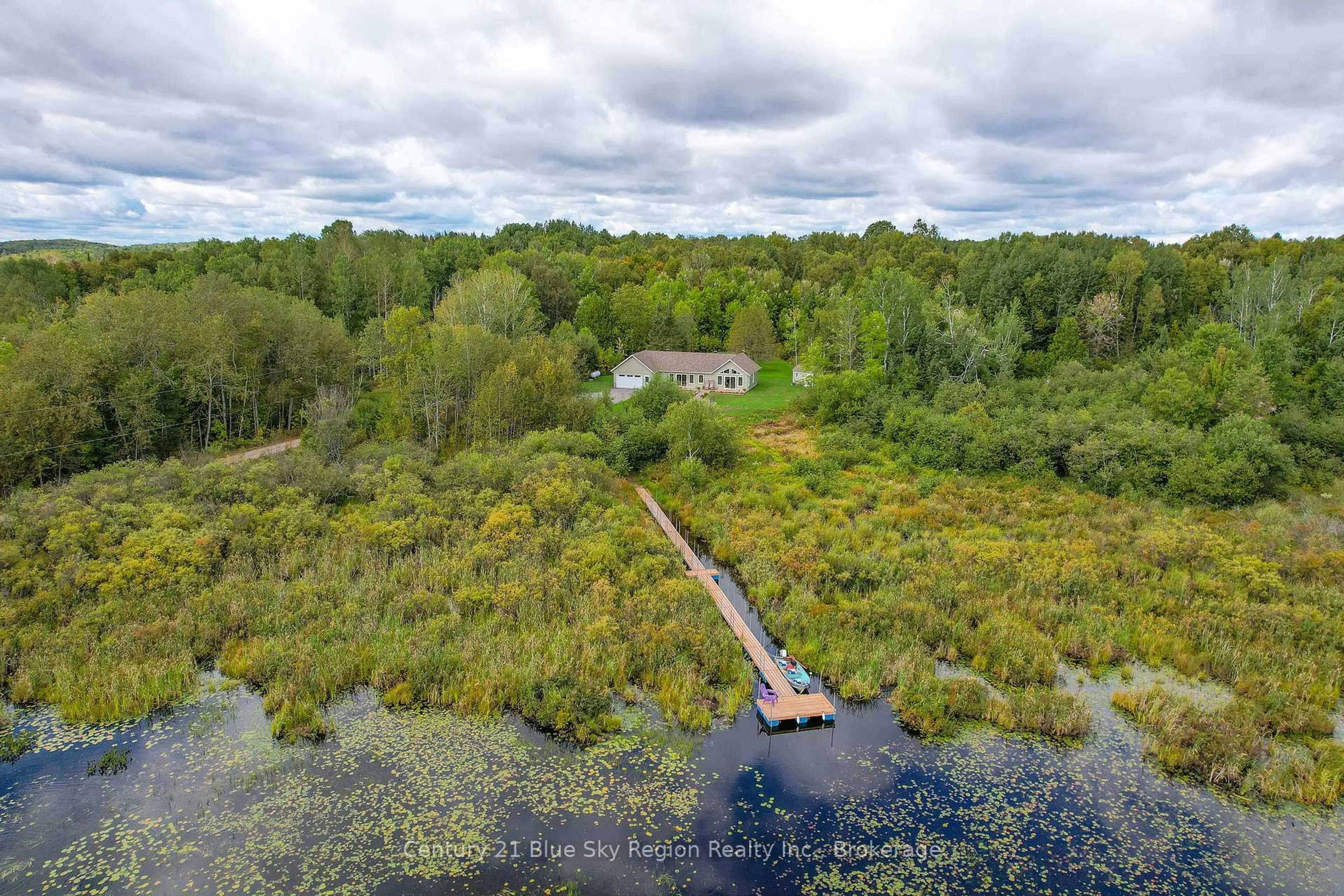 A pic from outside/outdoor area/front of a property/back of a property/a pic from drone, water/lake/river/ocean view for 398 Mallard Haven Rd, Chisholm Ontario P0H 1B0