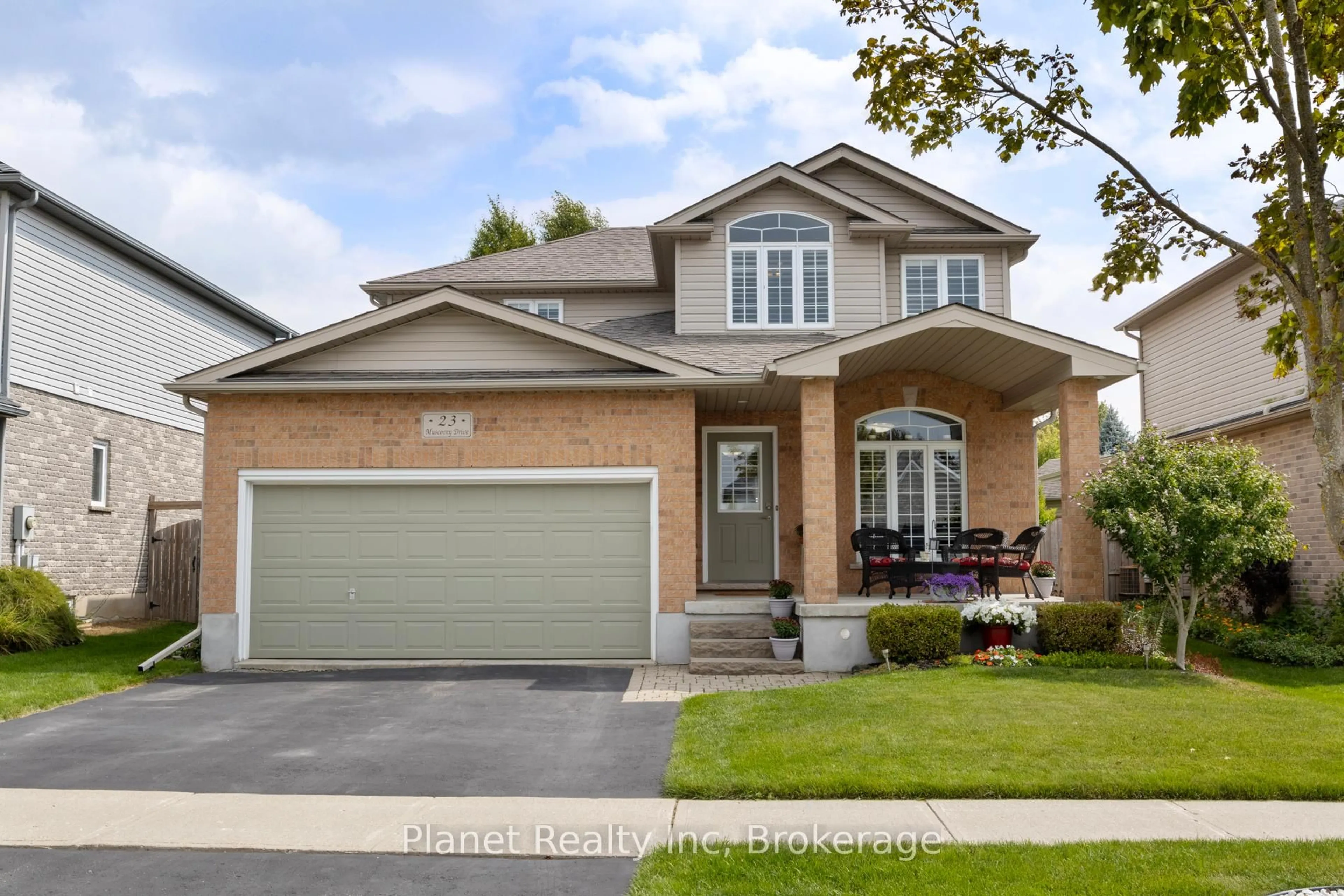 Home with brick exterior material, street for 23 Muscovey Dr, Woolwich Ontario N3B 3M5