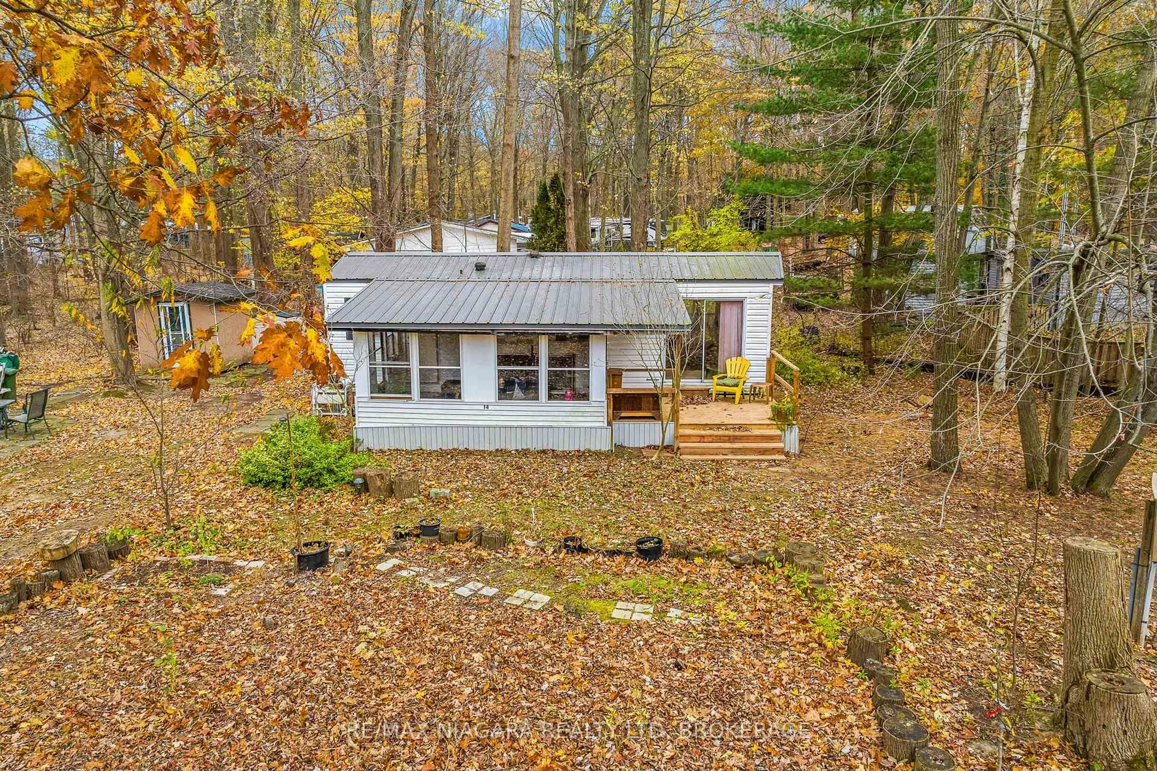 A pic from outside/outdoor area/front of a property/back of a property/a pic from drone, forest/trees view for 334 RATTLESNAKE Rd #14, Haldimand Ontario N0A 1K0