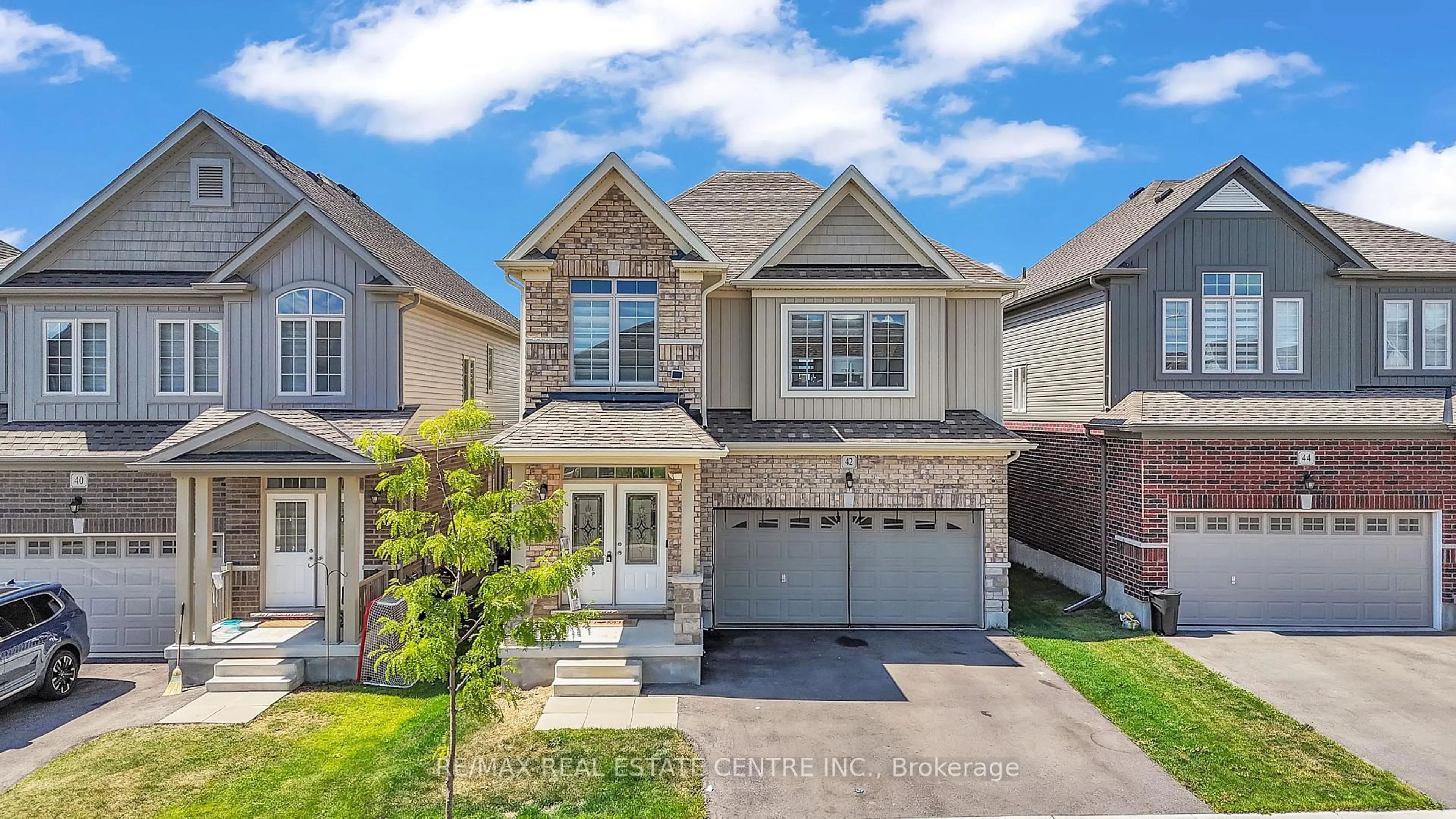 Home with brick exterior material, street for 42 Henry Maracle St, North Dumfries Ontario N0B 1E0