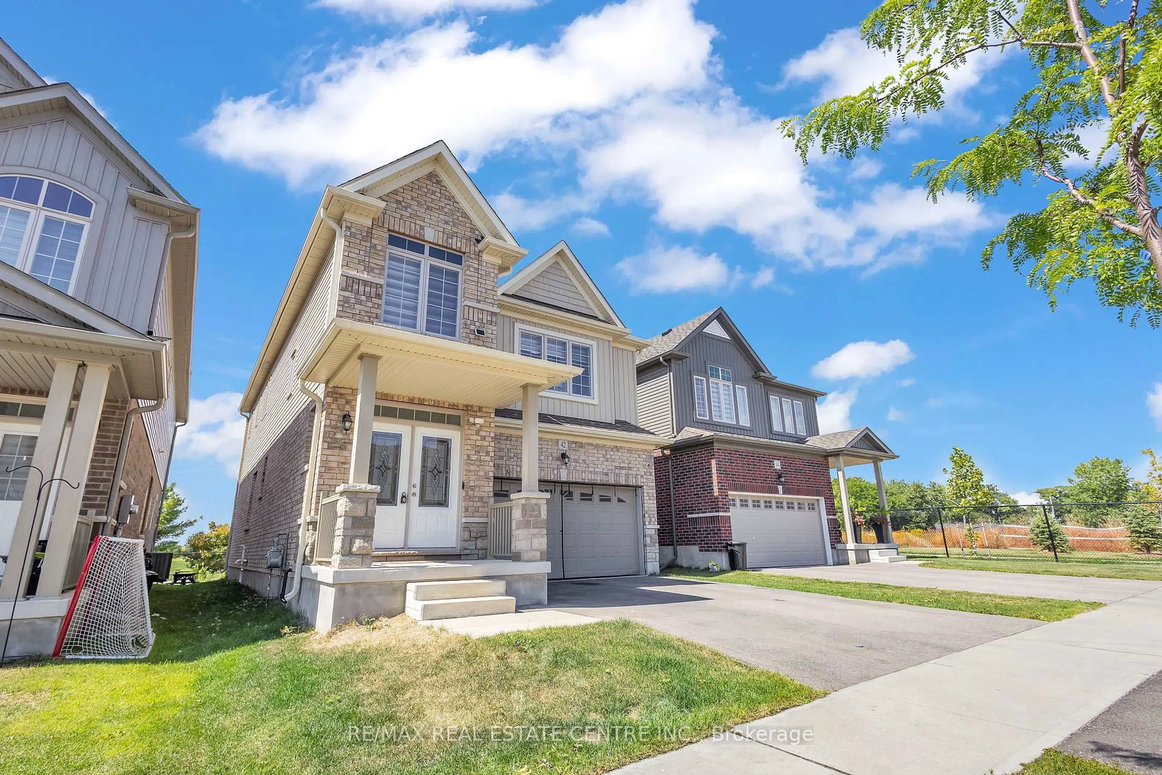 Home with brick exterior material, street for 42 Henry Maracle St, North Dumfries Ontario N0B 1E0