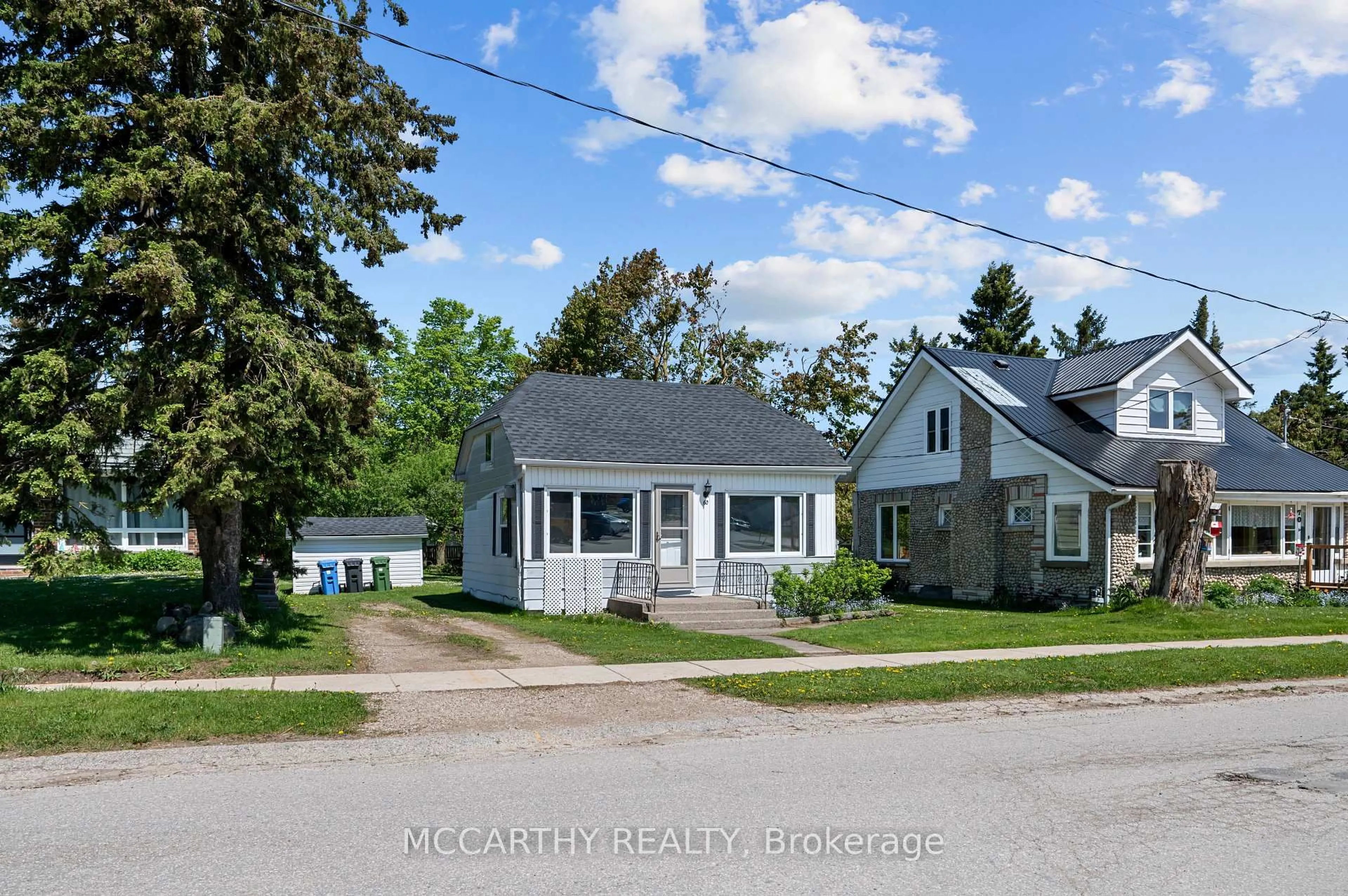 A pic from outside/outdoor area/front of a property/back of a property/a pic from drone, street for 60 Owen Sound St, Southgate Ontario N0C 1B0