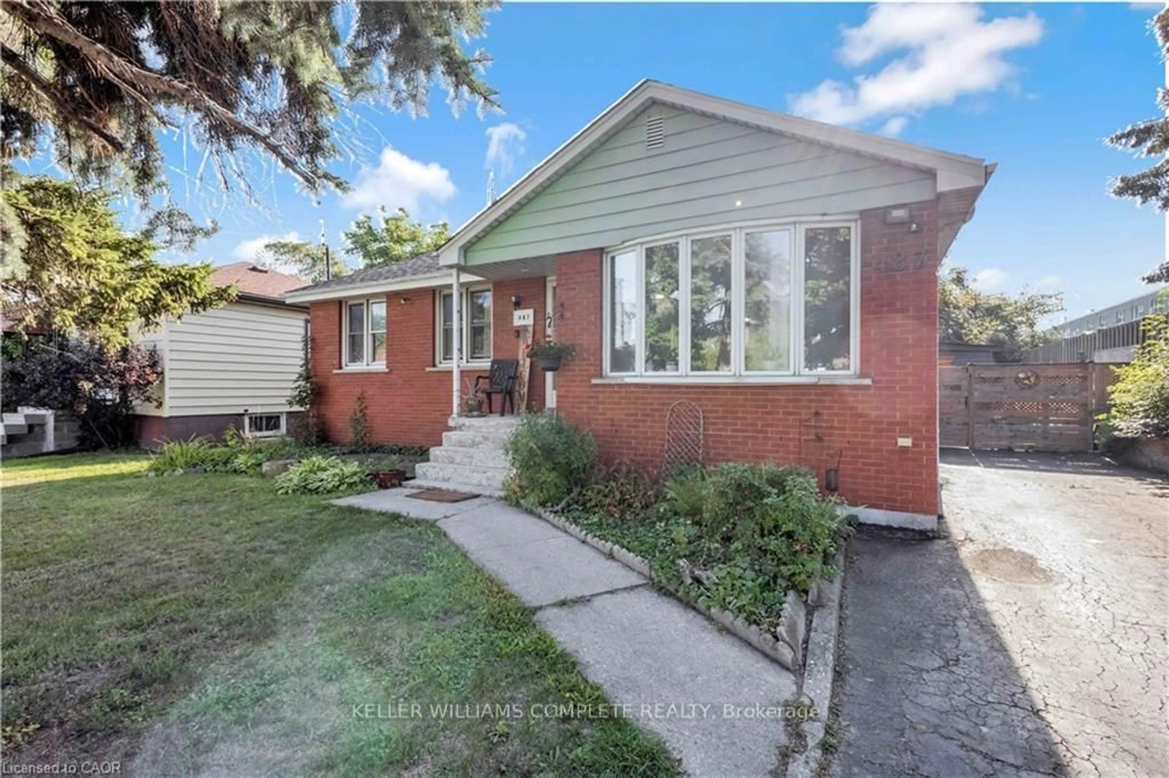 Home with brick exterior material, street for 487 EAST 37TH St, Hamilton Ontario L8V 4C1