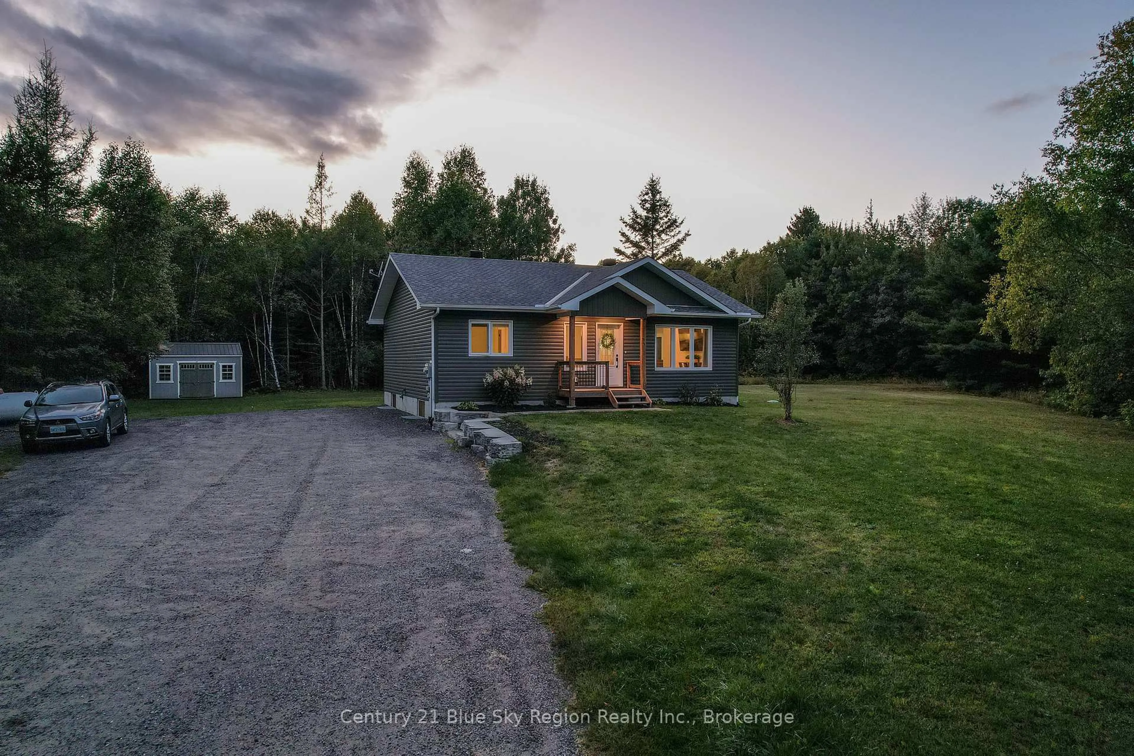 A pic from outside/outdoor area/front of a property/back of a property/a pic from drone, street for 115 Hillside Lake Rd, North Bay Ontario P1B 8G2