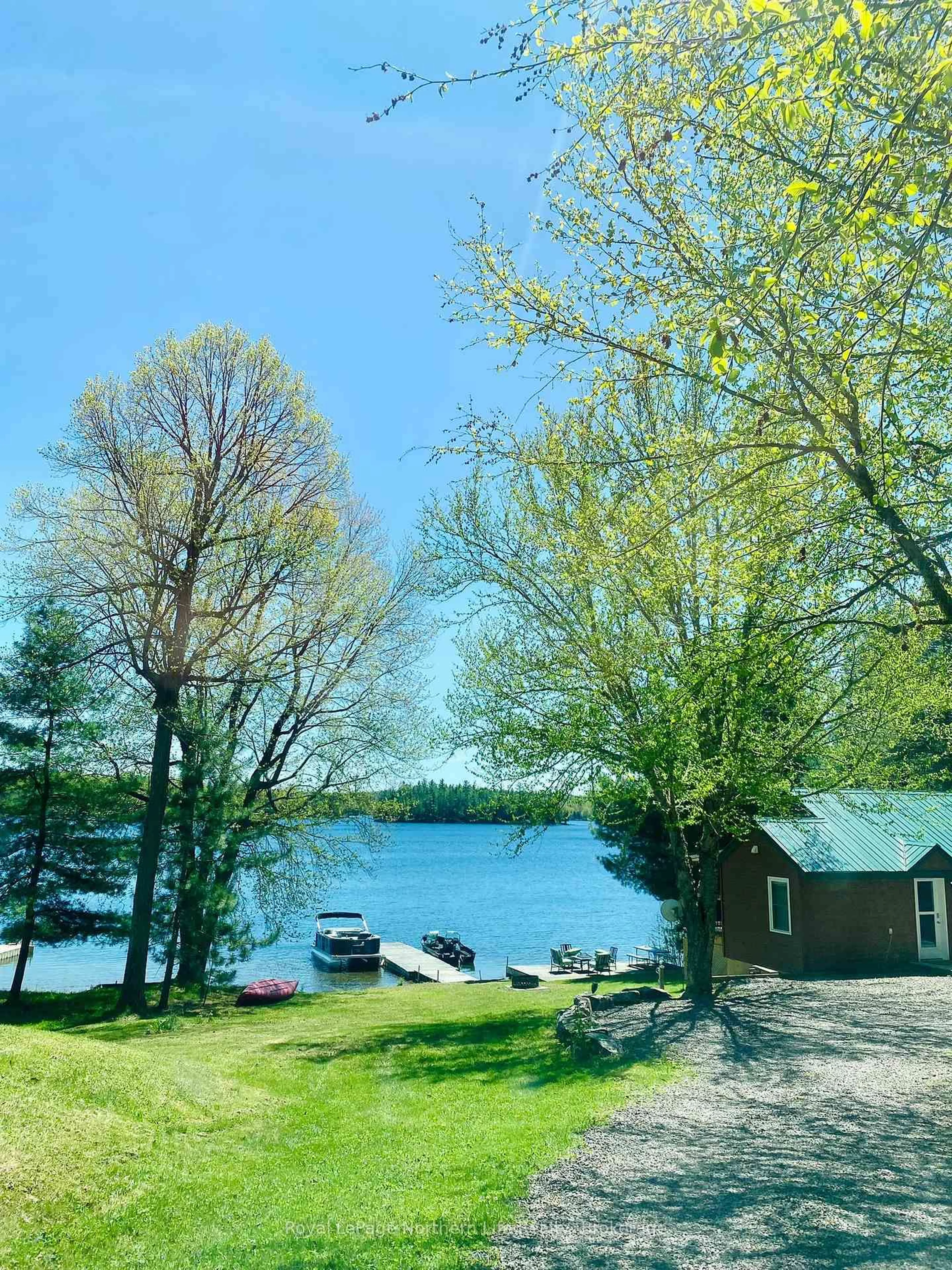A pic from outside/outdoor area/front of a property/back of a property/a pic from drone, water/lake/river/ocean view for 2251 Peninsula Rd, North Bay Ontario P1B 8G4