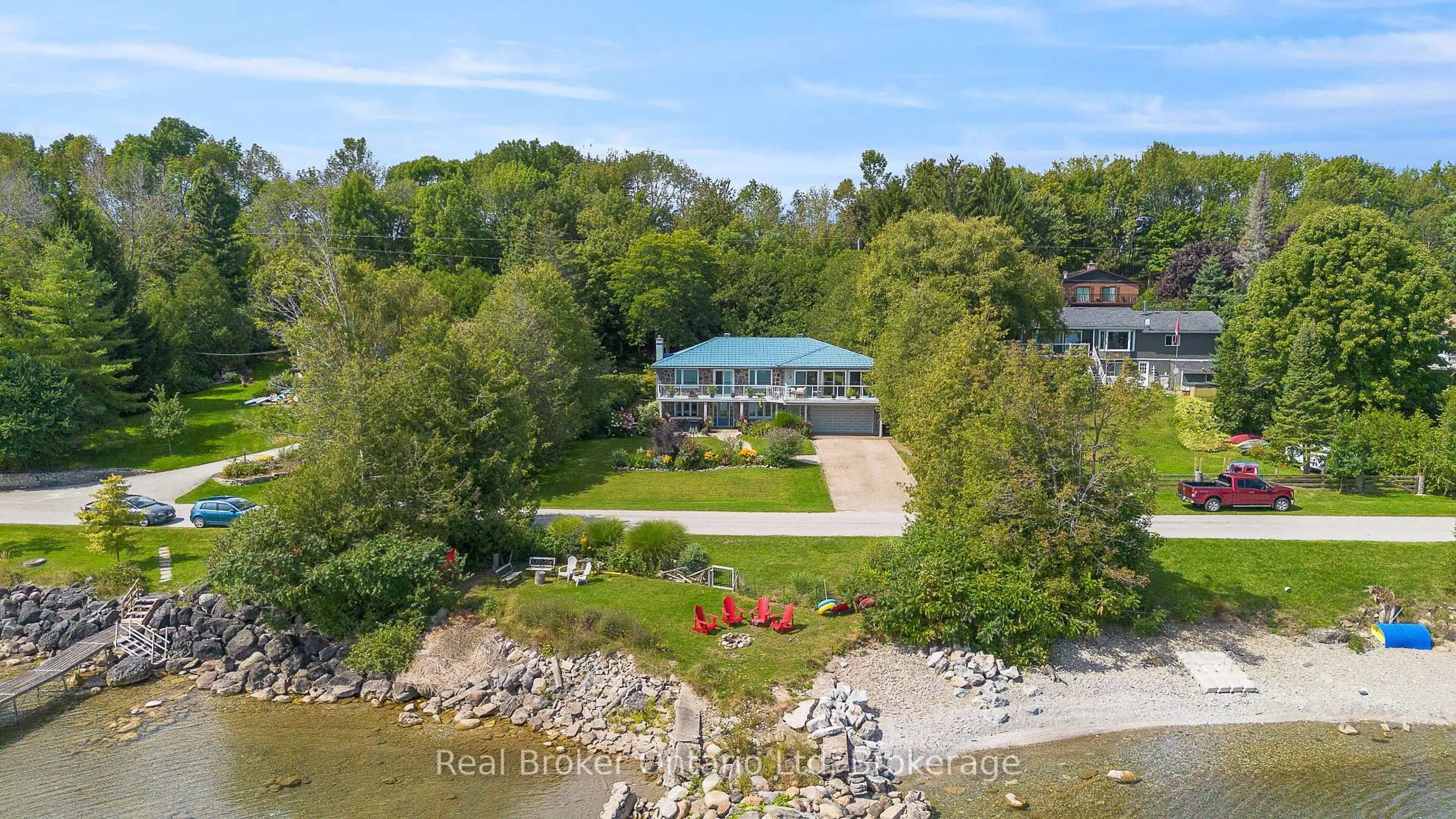 A pic from outside/outdoor area/front of a property/back of a property/a pic from drone, water/lake/river/ocean view for 339496 Presquile Rd, Georgian Bluffs Ontario N0H 2T0