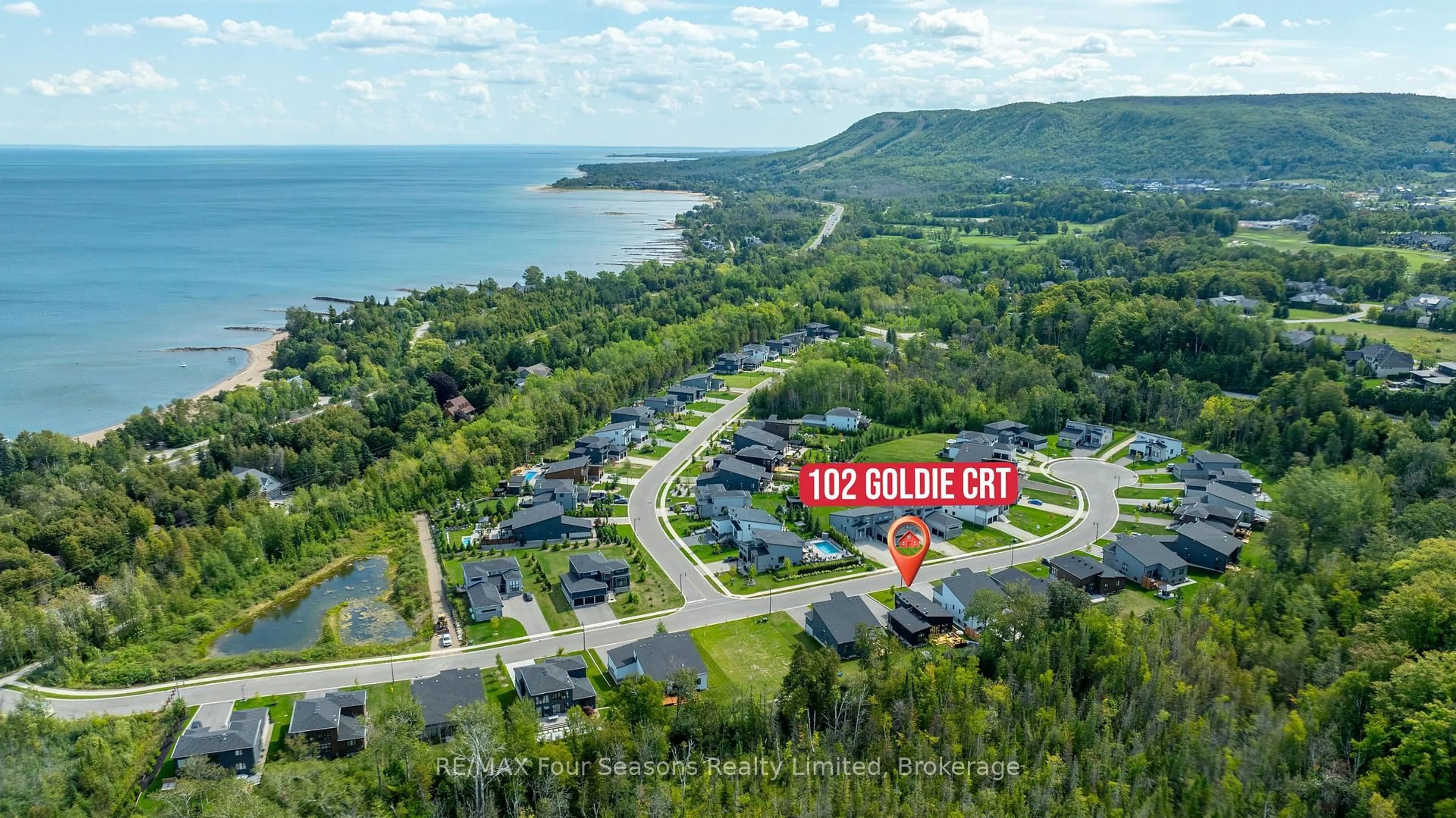 A pic from outside/outdoor area/front of a property/back of a property/a pic from drone, water/lake/river/ocean view for 102 Goldie Crt, Blue Mountains Ontario N0H 1J0