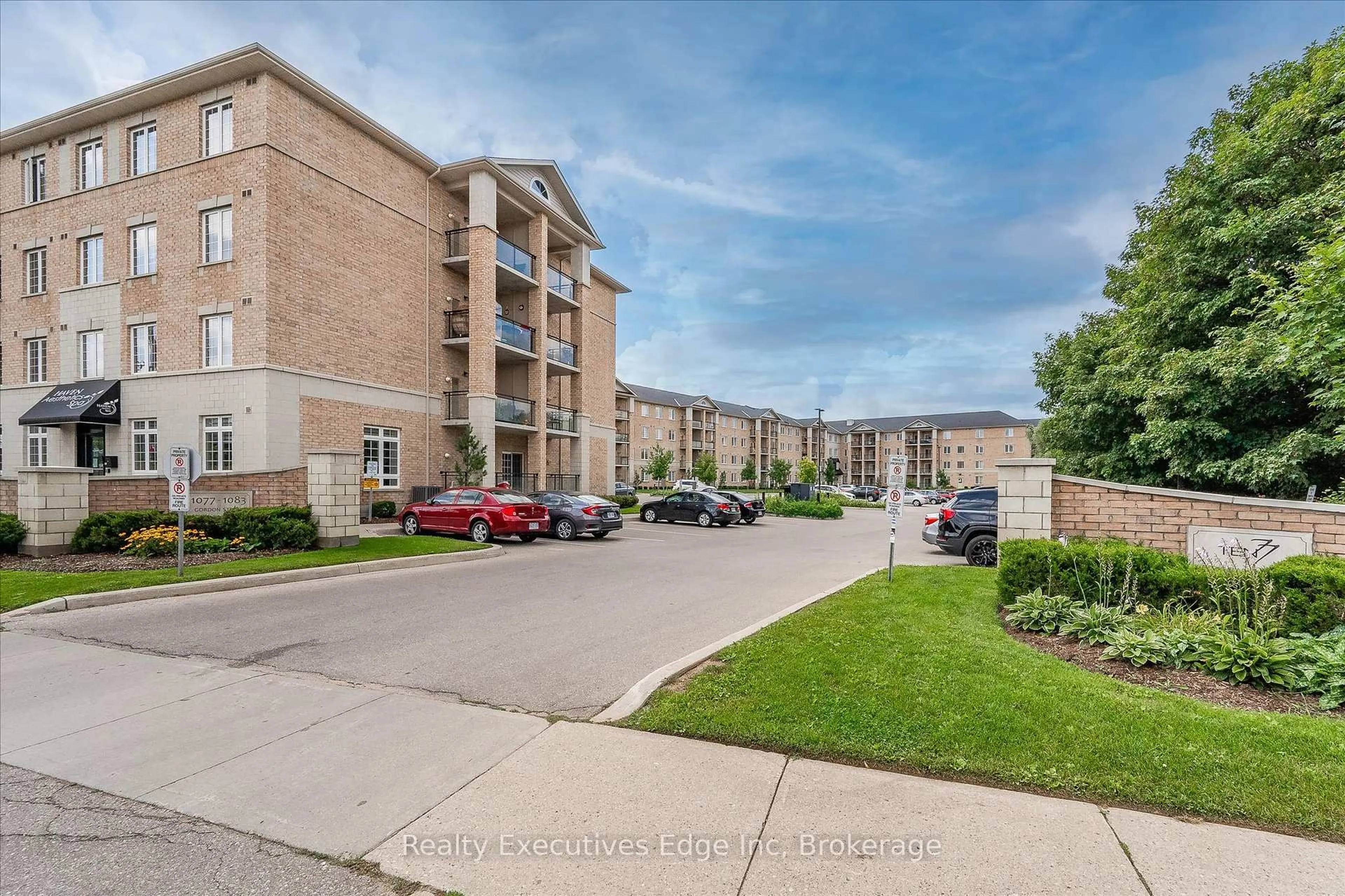 A pic from outside/outdoor area/front of a property/back of a property/a pic from drone, unknown for 1077 Gordon St #323, Guelph Ontario N1G 0E3