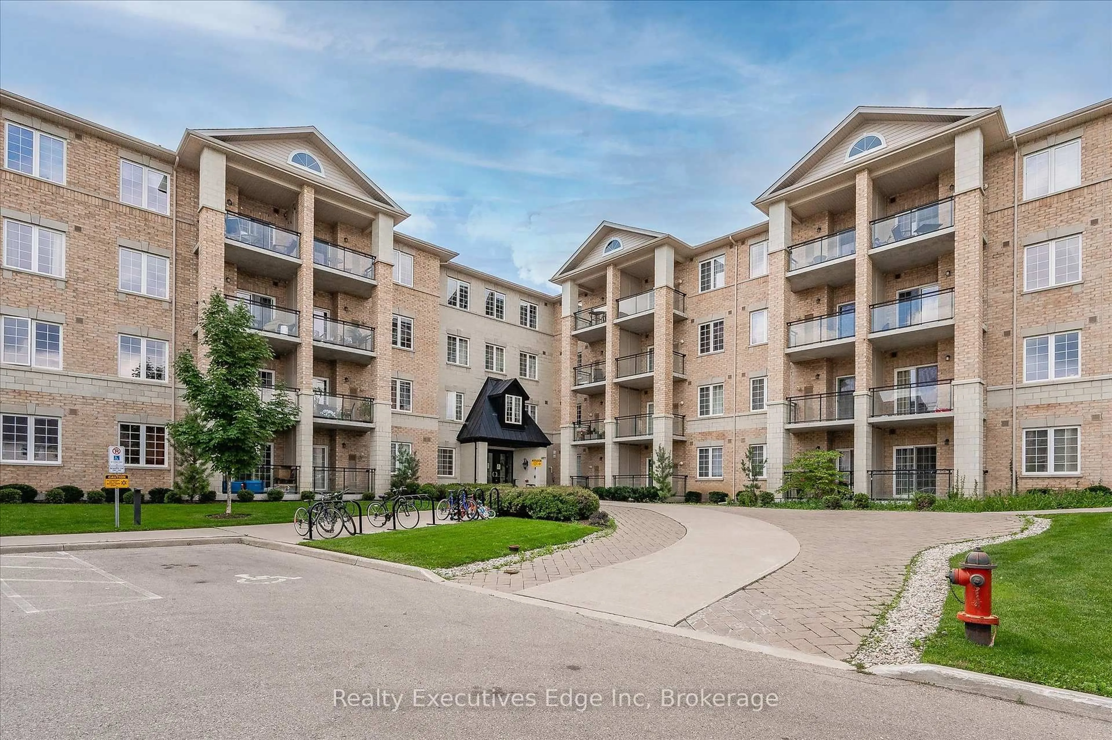 A pic from outside/outdoor area/front of a property/back of a property/a pic from drone, unknown for 1077 Gordon St #323, Guelph Ontario N1G 0E3