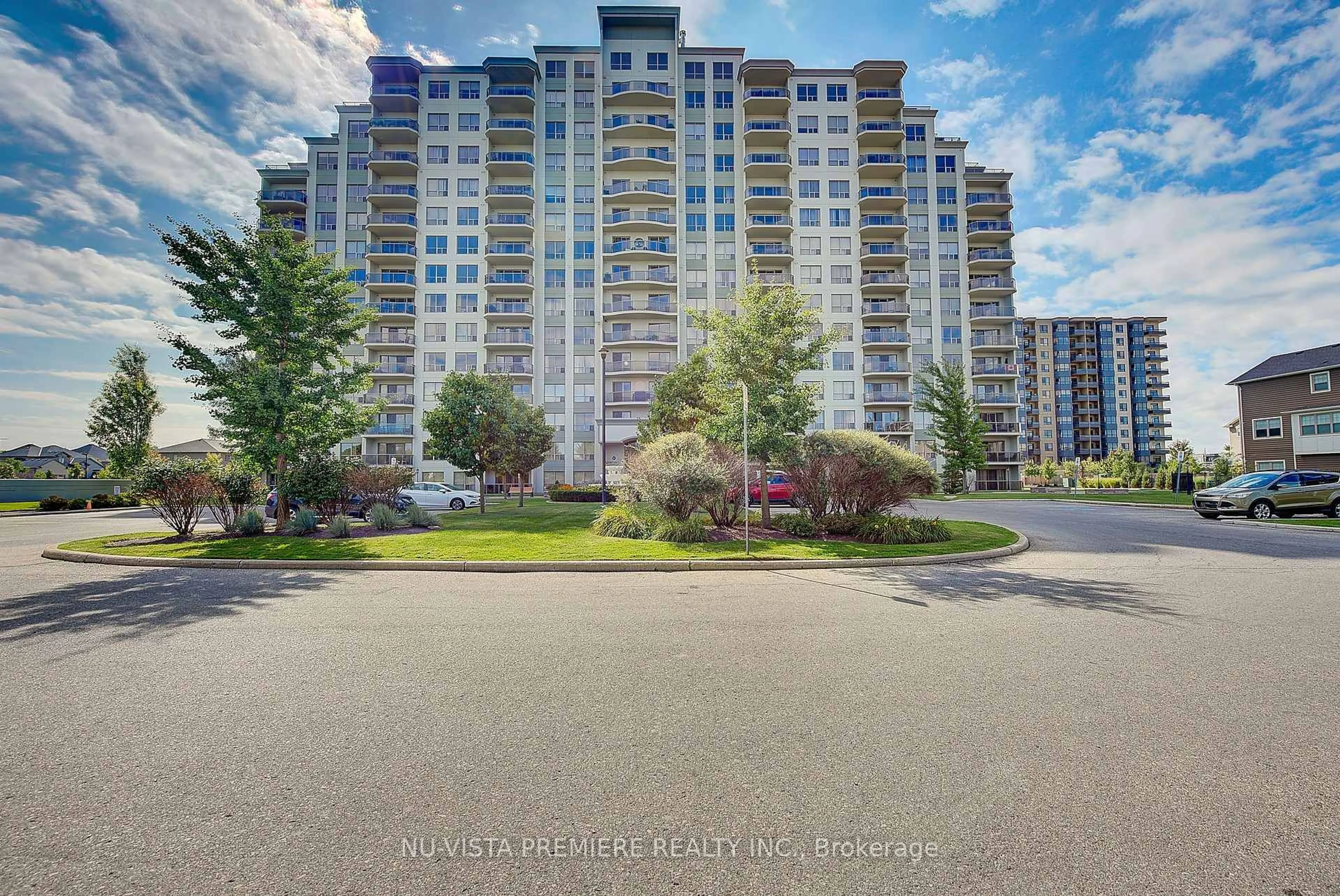A pic from outside/outdoor area/front of a property/back of a property/a pic from drone, unknown for 1030 Coronation Dr #406, London North Ontario N6G 0G5