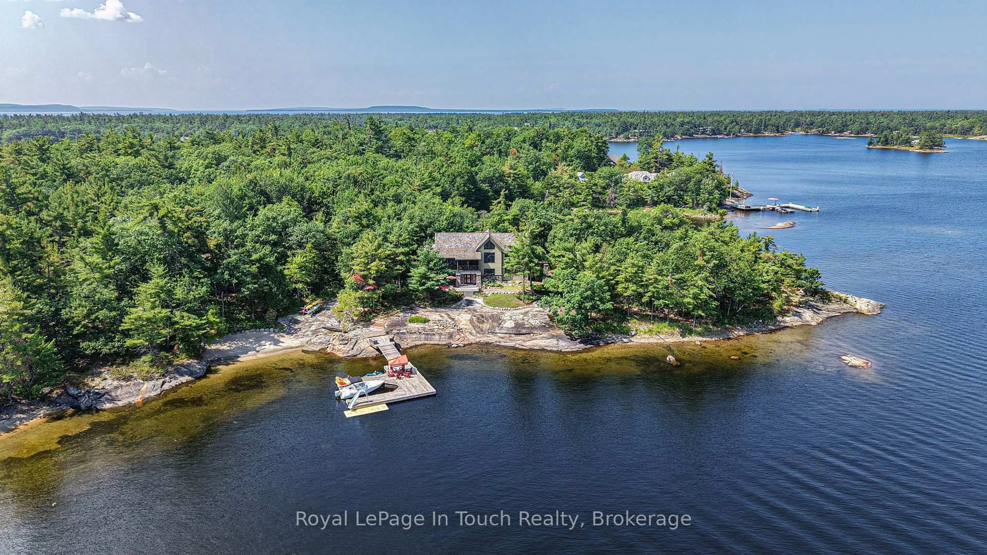 A pic from outside/outdoor area/front of a property/back of a property/a pic from drone, water/lake/river/ocean view for 4 Is 2075 Arthur Island, Georgian Bay, Georgian Bay Ontario P0E 1E0