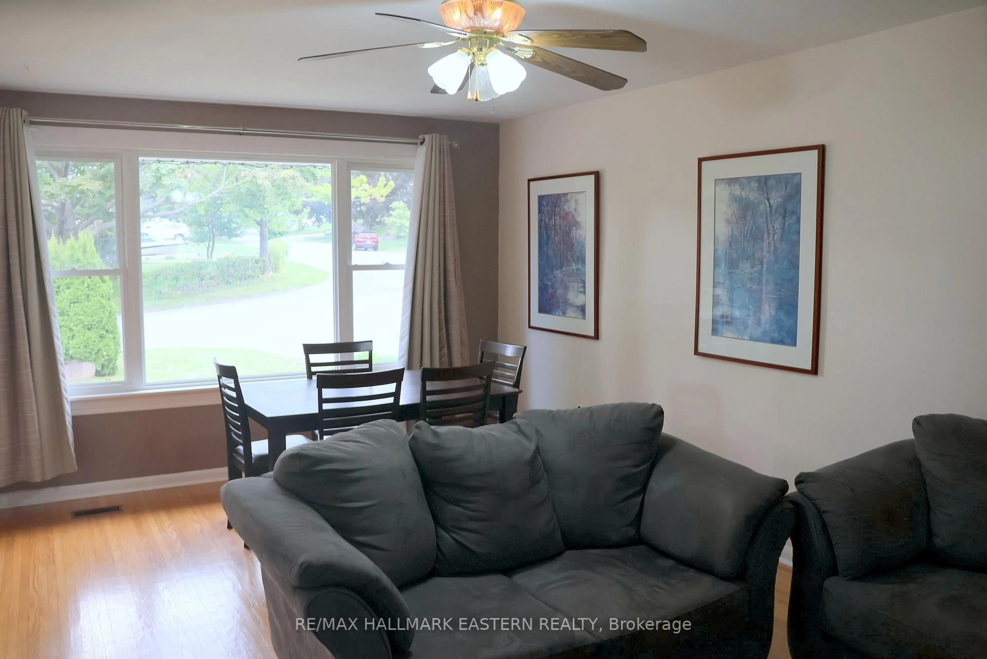 Living room with furniture, wood/laminate floor for 350 Dominion Cres, Peterborough Ontario K9H 5H1