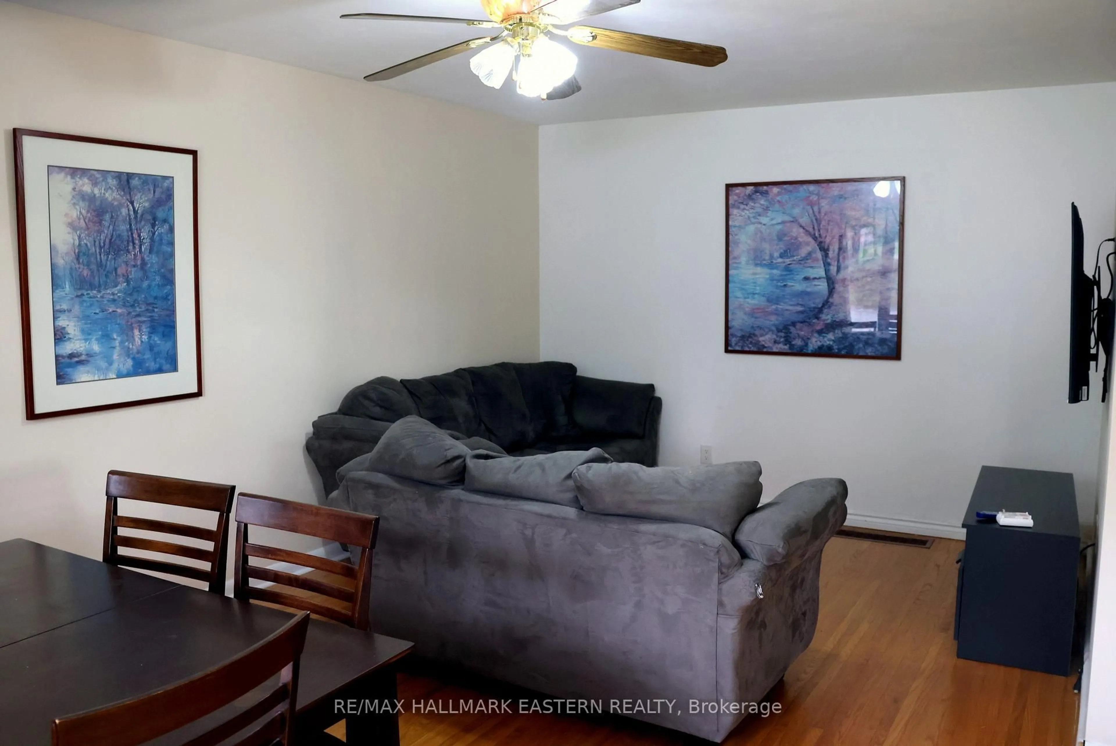 Living room with furniture, wood/laminate floor for 350 Dominion Cres, Peterborough Ontario K9H 5H1