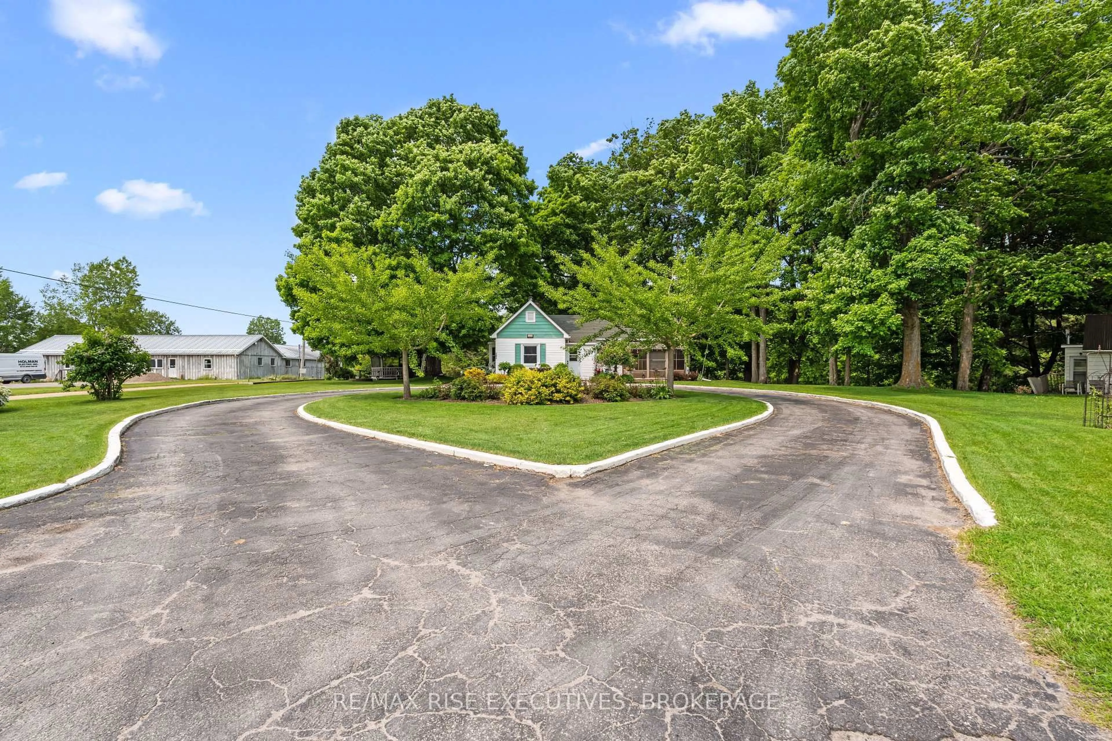 A pic from outside/outdoor area/front of a property/back of a property/a pic from drone, street for 204 R33, Rideau Lakes Ontario K0G 1V0