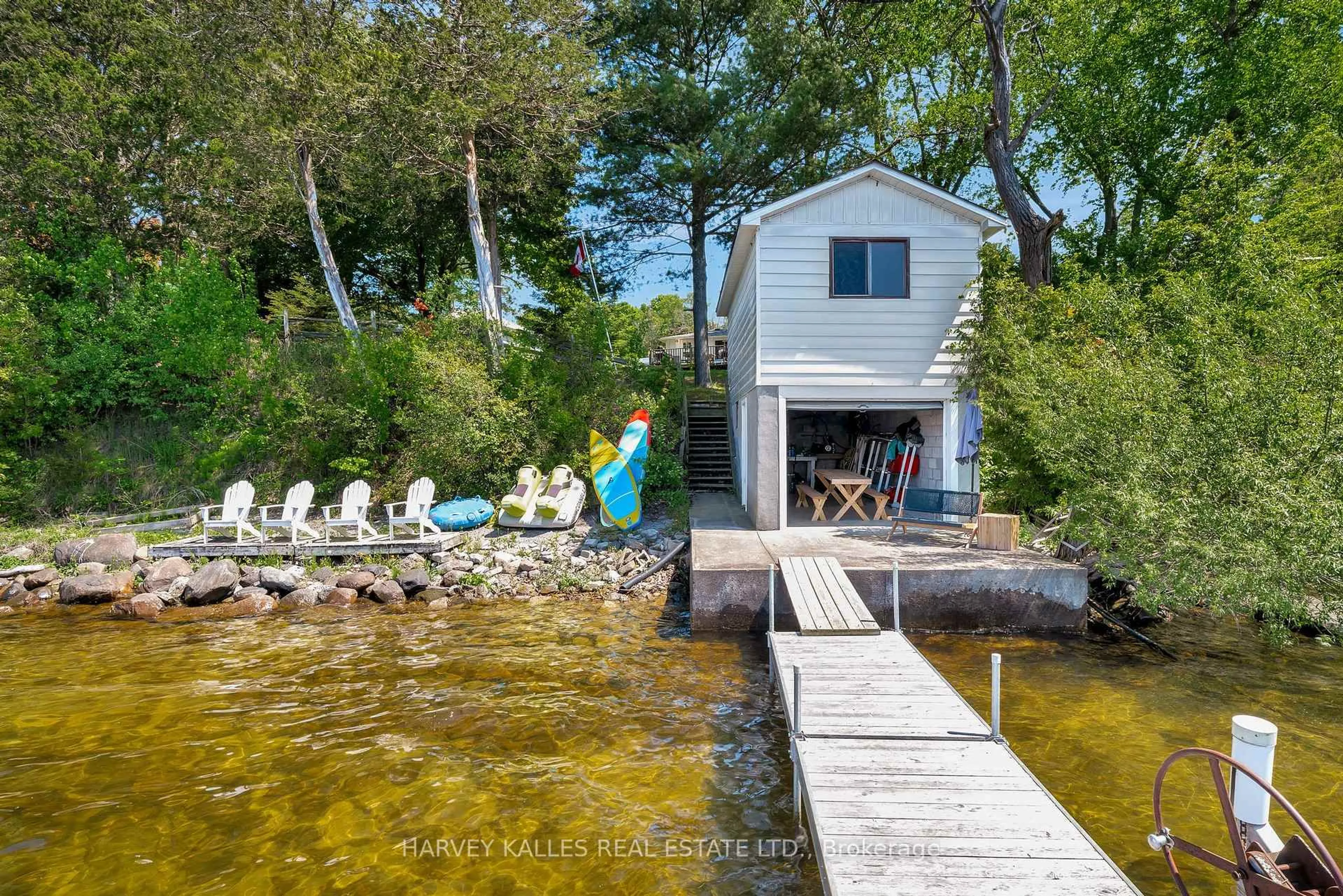 A pic from outside/outdoor area/front of a property/back of a property/a pic from drone, water/lake/river/ocean view for 101 Treasure Cove Lane, Prince Edward County Ontario K0K 2T0