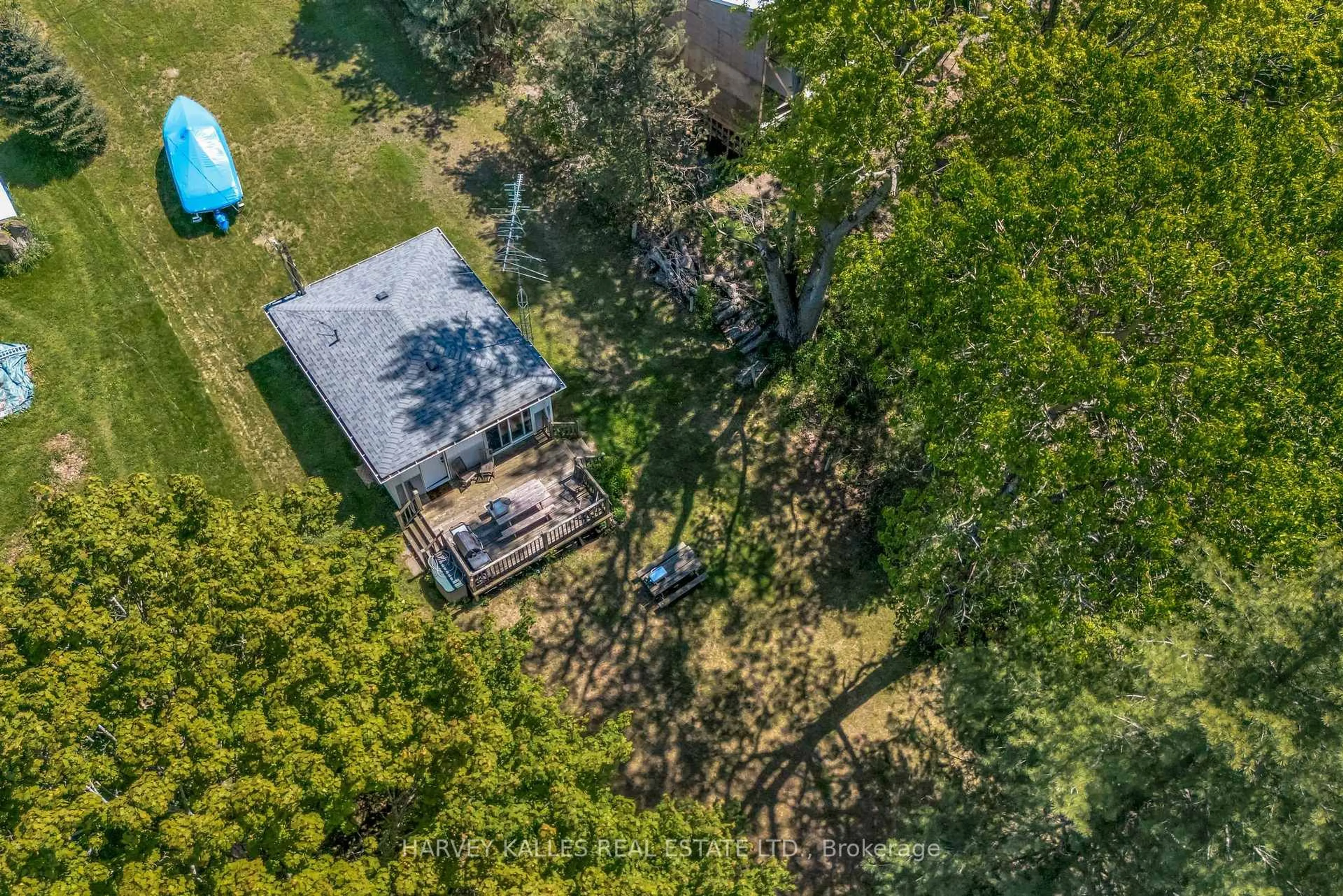A pic from outside/outdoor area/front of a property/back of a property/a pic from drone, forest/trees view for 101 Treasure Cove Lane, Prince Edward County Ontario K0K 2T0