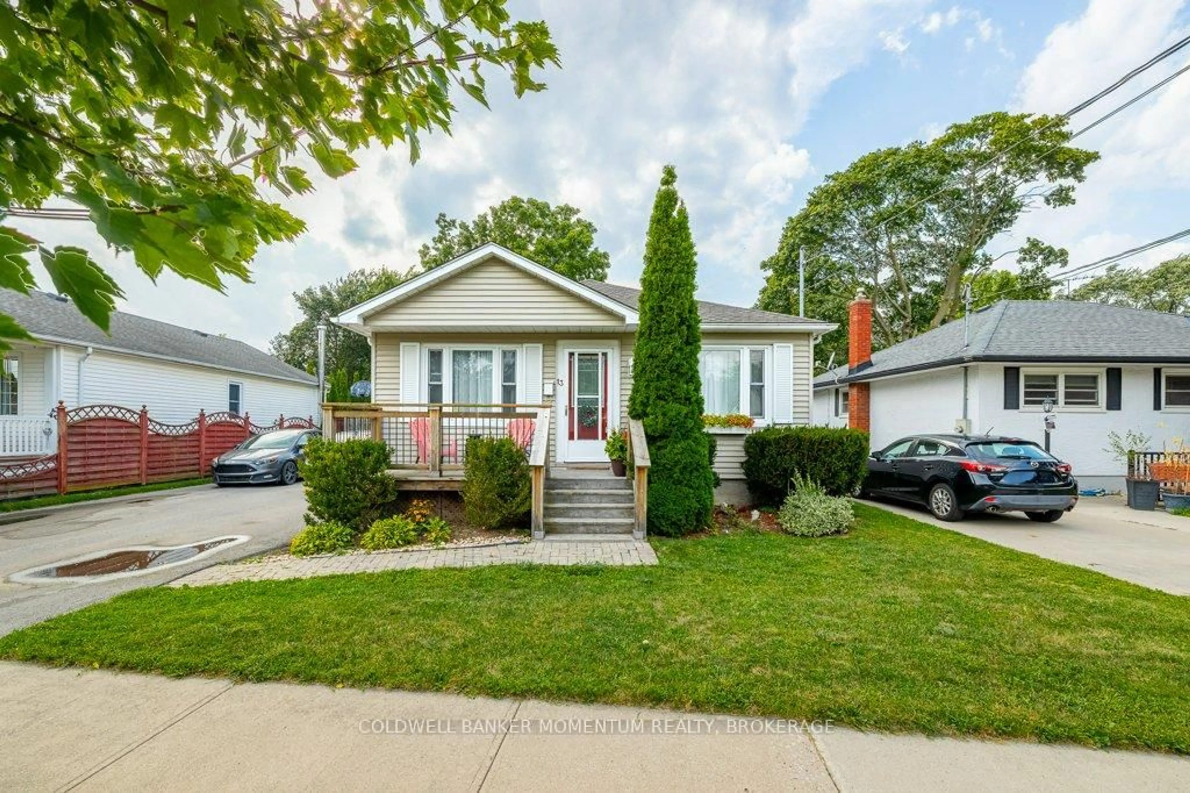 Home with vinyl exterior material, street for 13 Duncan Dr, St. Catharines Ontario L2N 3N8
