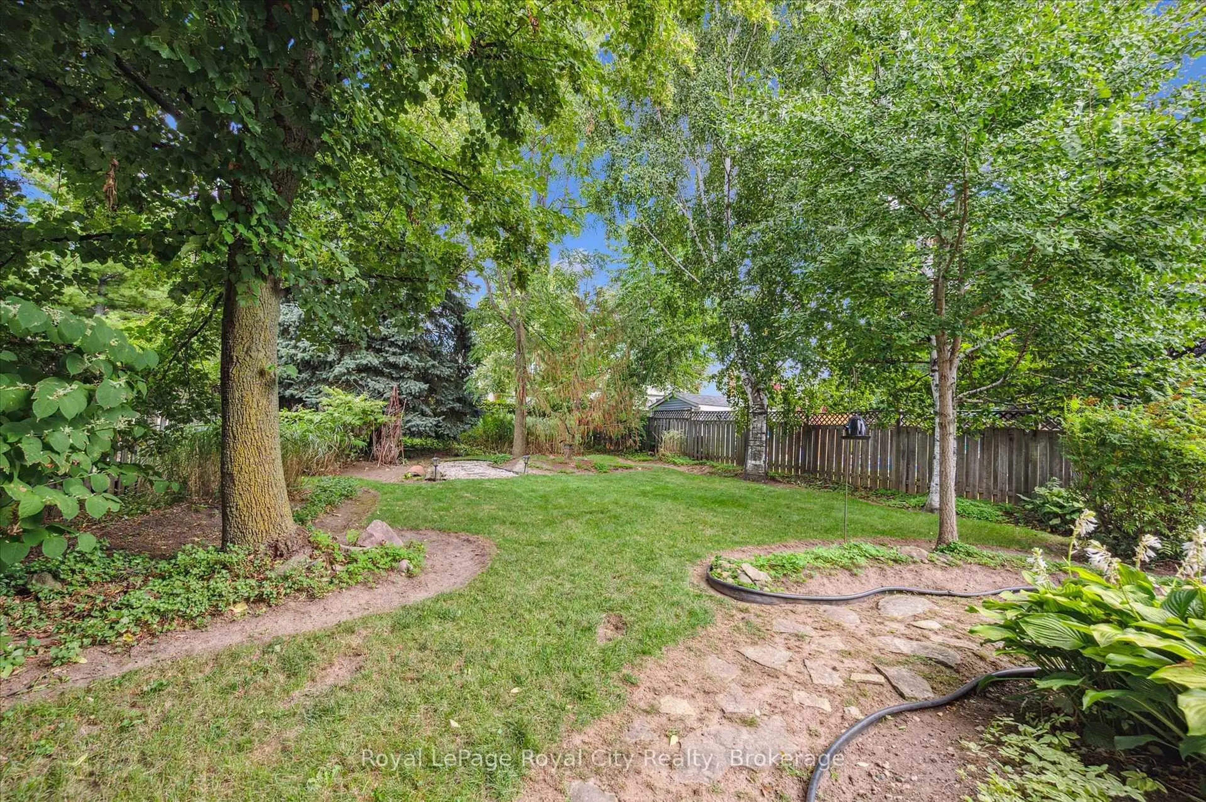 Patio, forest/trees view for 39 Greenwich Dr, Guelph Ontario N1H 8C5