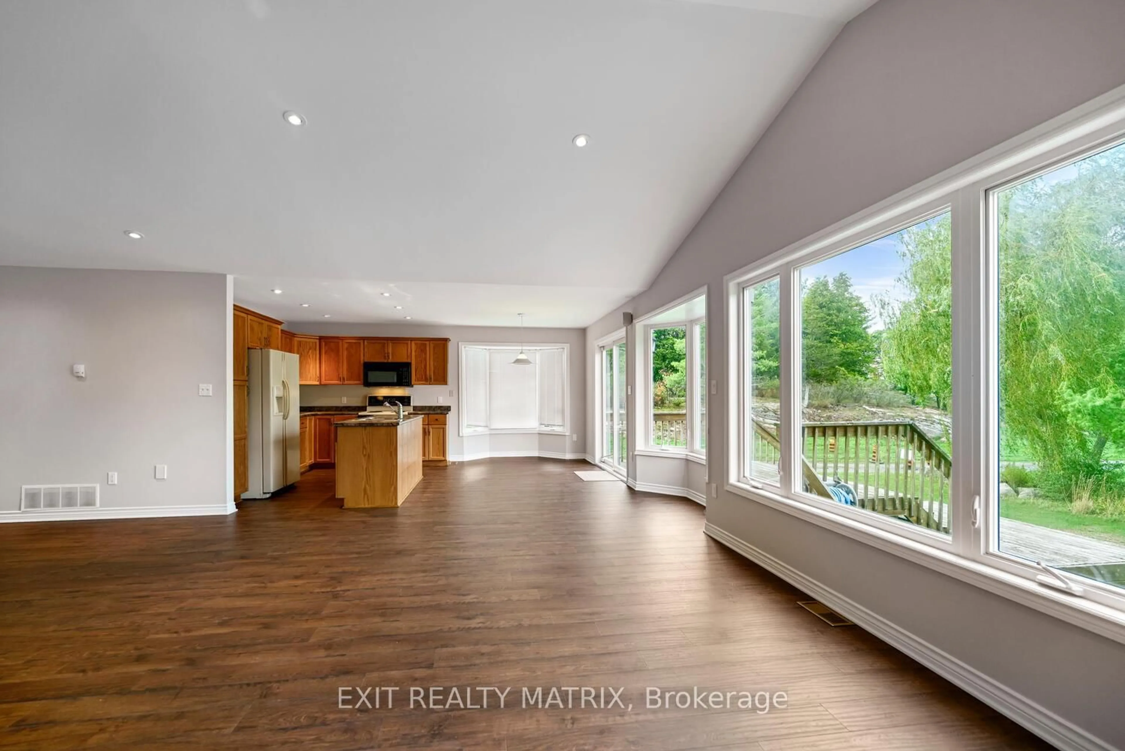 Open concept kitchen, wood/laminate floor for 145 Garfield St, Gananoque Ontario K7G 3G2