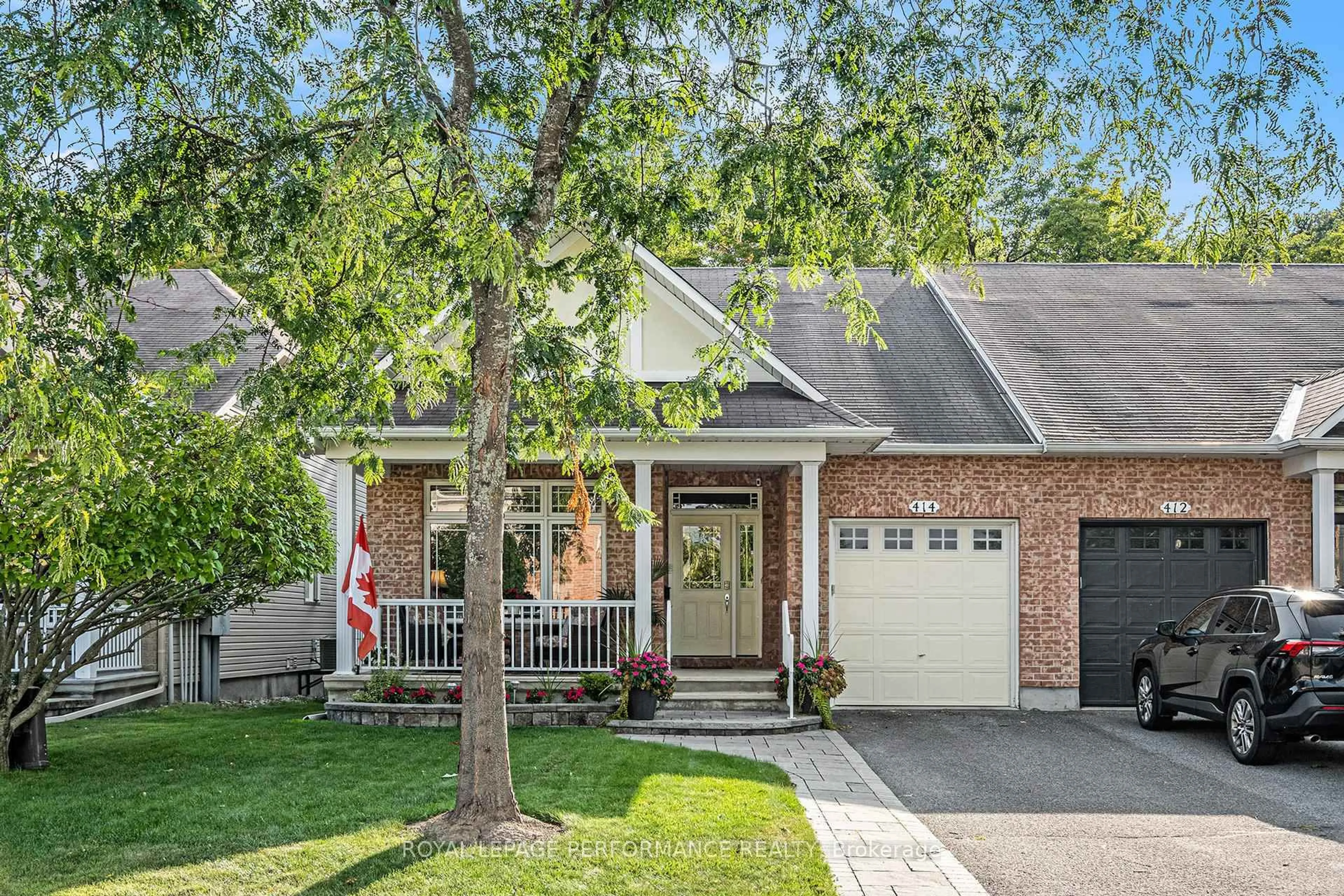 Home with brick exterior material, street for 414 Statewood Dr, Ottawa Ontario K2K 0B7