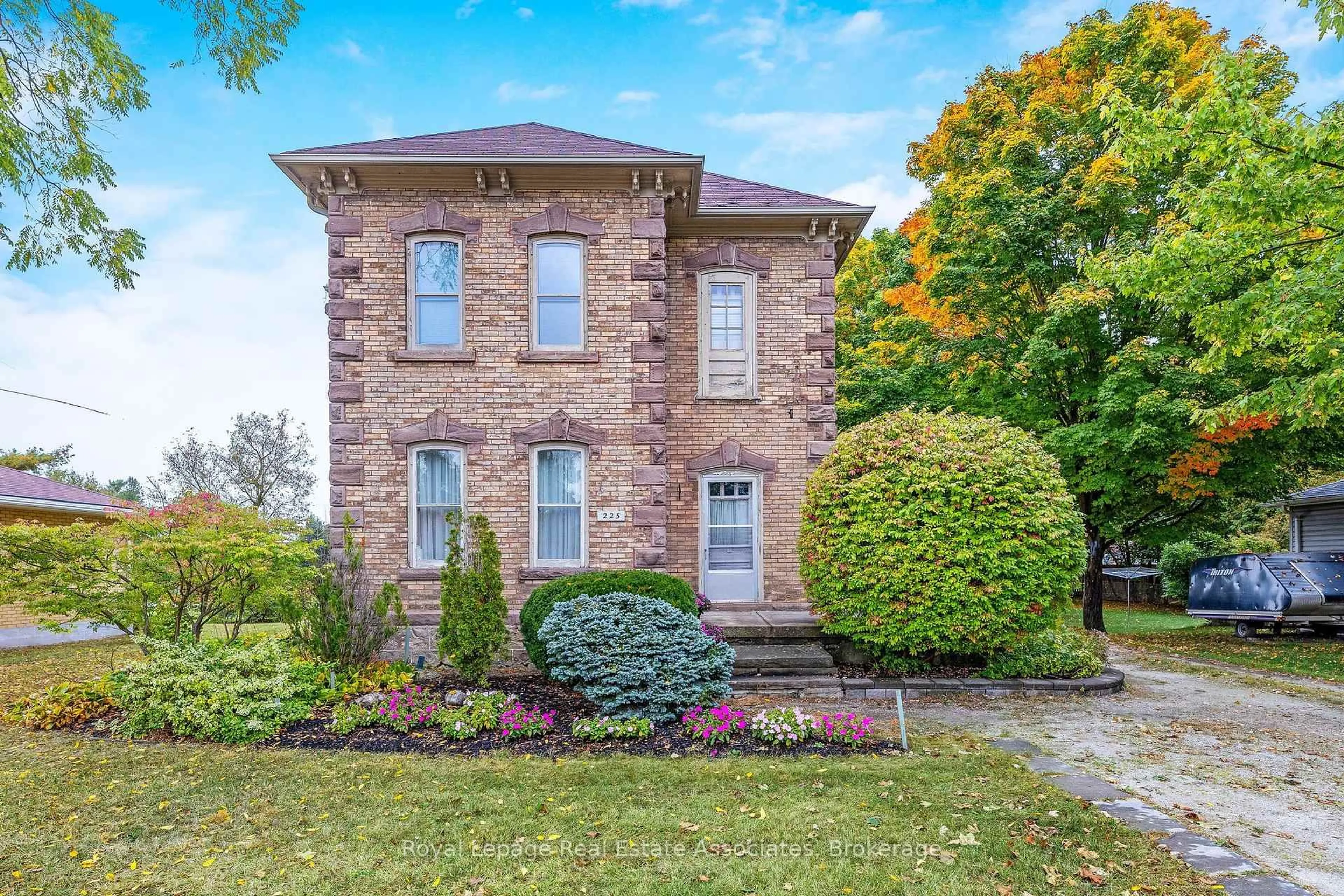 Home with brick exterior material, street for 225 Main St, Erin Ontario N0B 1T0
