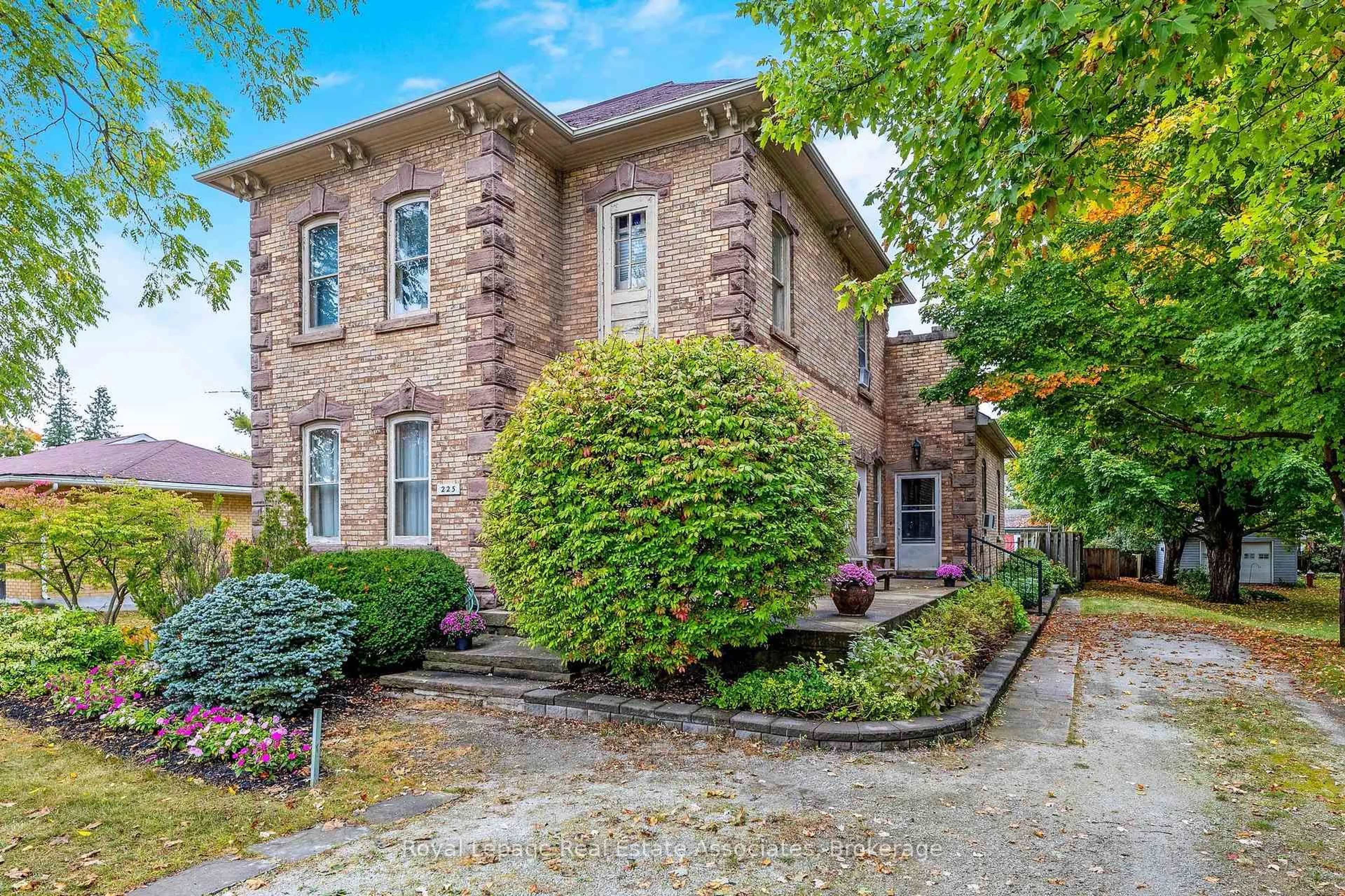 Home with brick exterior material, street for 225 Main St, Erin Ontario N0B 1T0