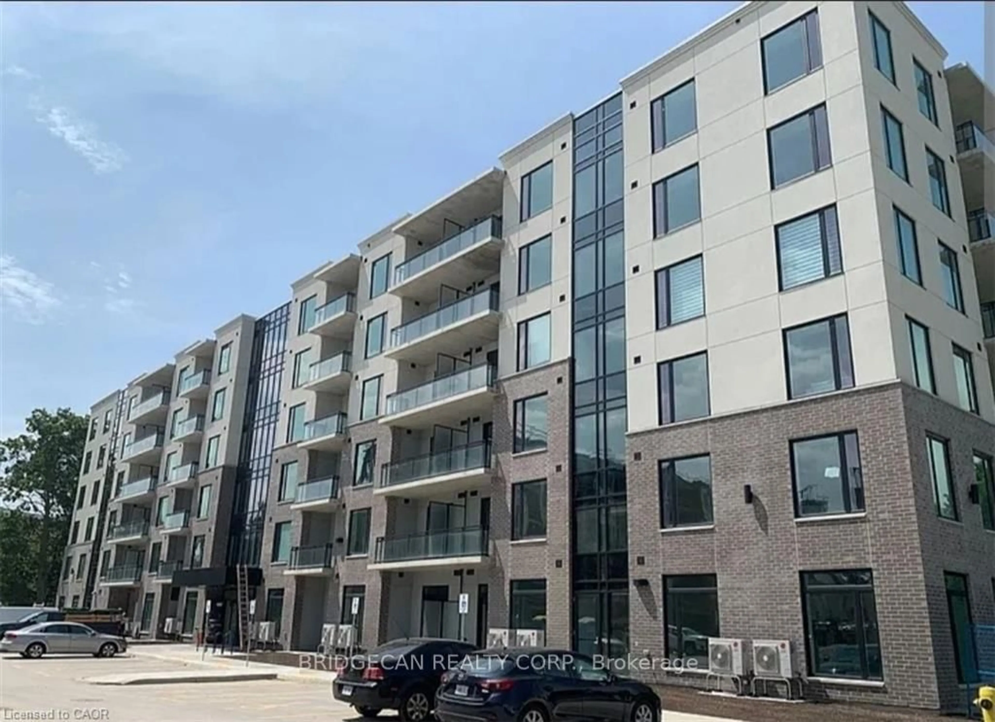 A pic from outside/outdoor area/front of a property/back of a property/a pic from drone, building for 103 Roger St #306, Waterloo Ontario N2J 0G2