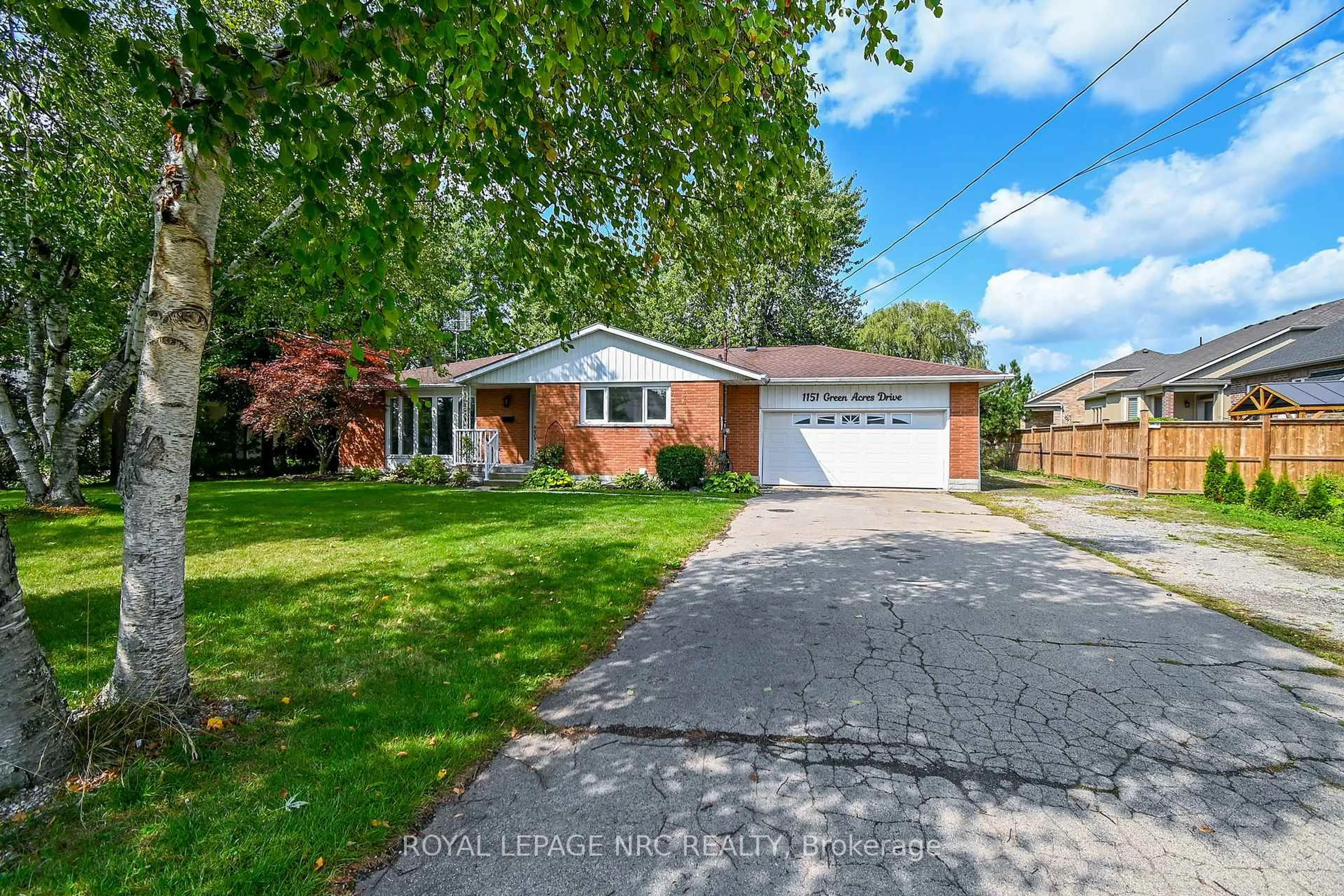 Home with brick exterior material, street for 1151 Green Acres Dr, Fort Erie Ontario L2A 5P2
