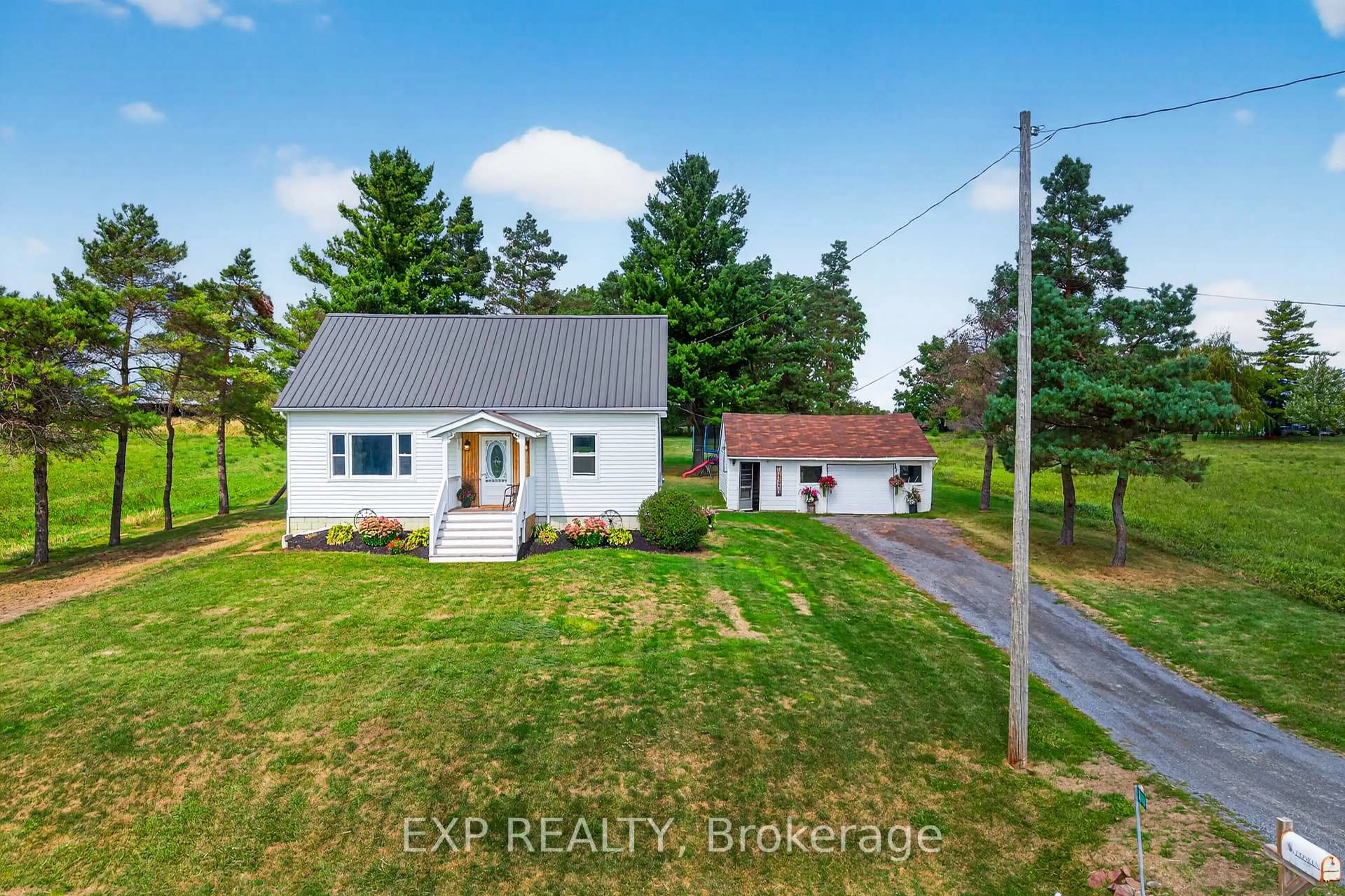 A pic from outside/outdoor area/front of a property/back of a property/a pic from drone, unknown for 2619 County Rd 11 Rd, Greater Napanee Ontario K0K 2Z0