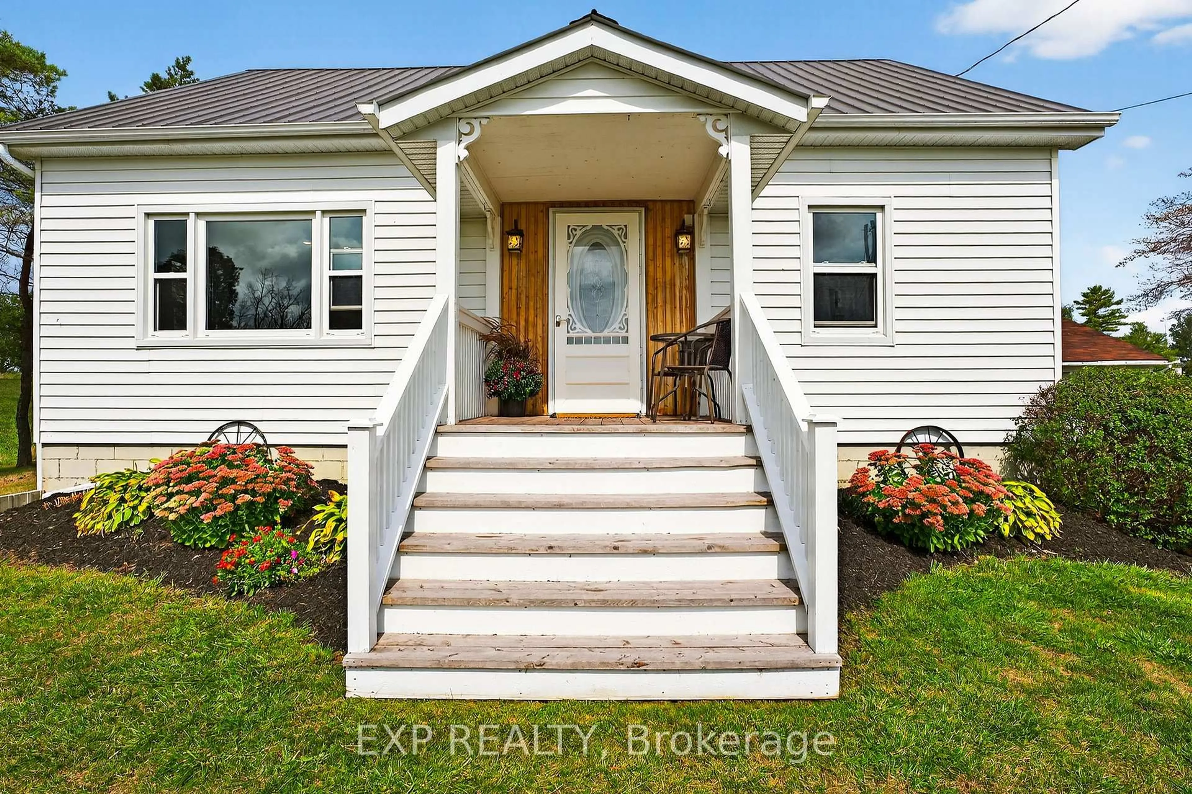Home with vinyl exterior material, street for 2619 County Rd 11 Rd, Greater Napanee Ontario K0K 2Z0