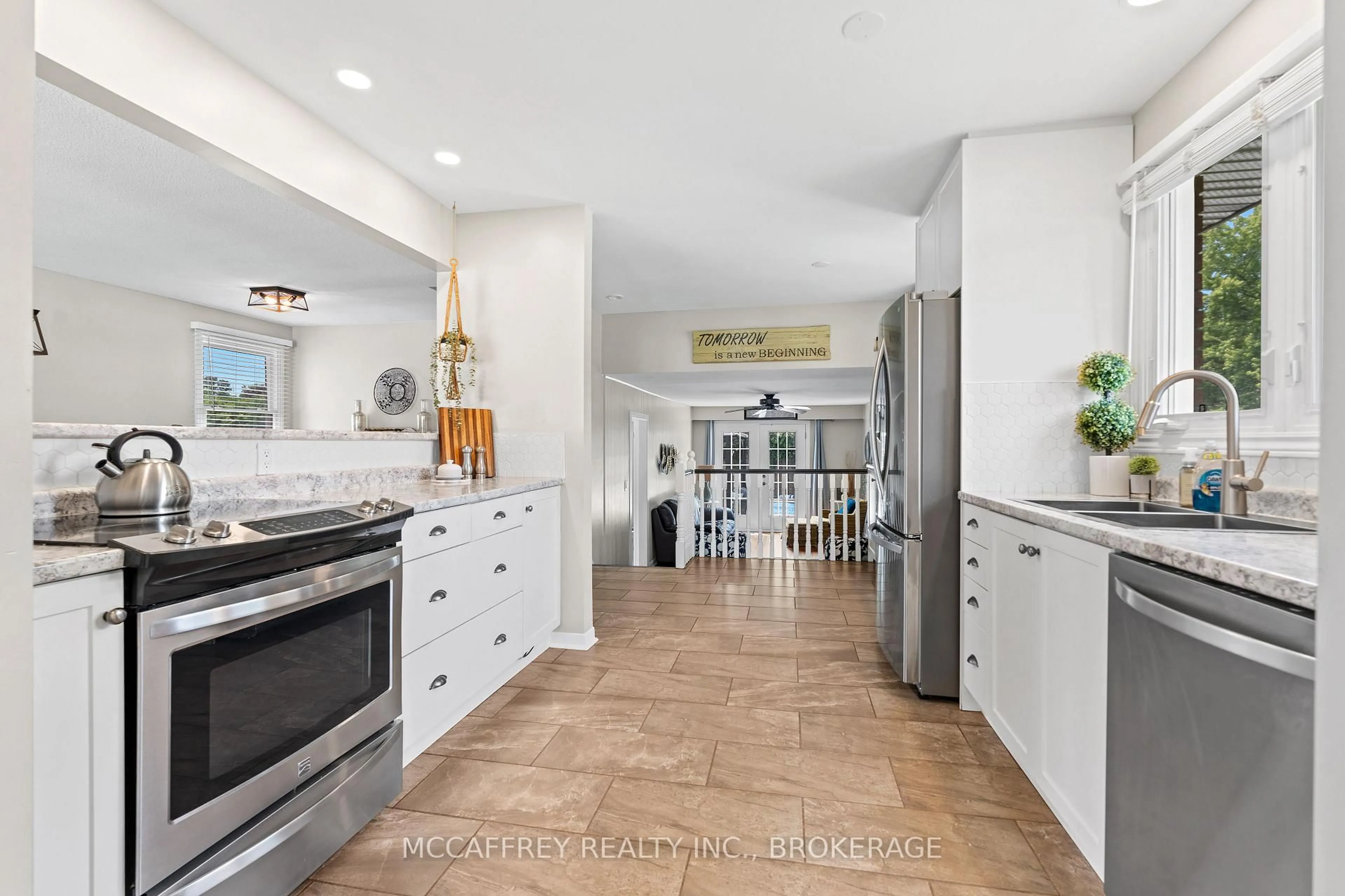 Open concept kitchen, ceramic/tile floor for 801 High Gate Park Dr, Kingston Ontario K7M 5Z5