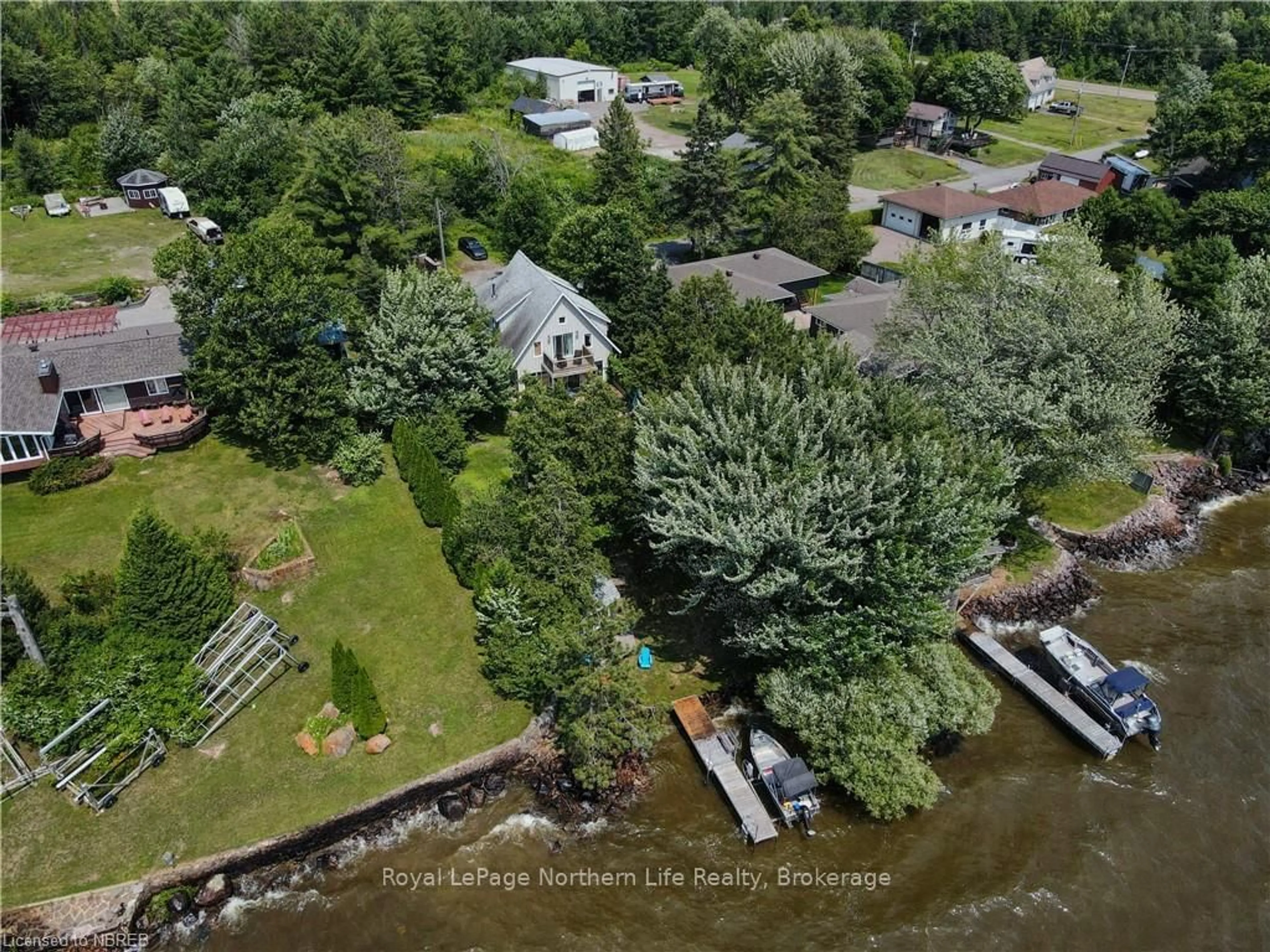 A pic from outside/outdoor area/front of a property/back of a property/a pic from drone, water/lake/river/ocean view for 220 Du Lac Prom, West Nipissing Ontario P2B 2Y1