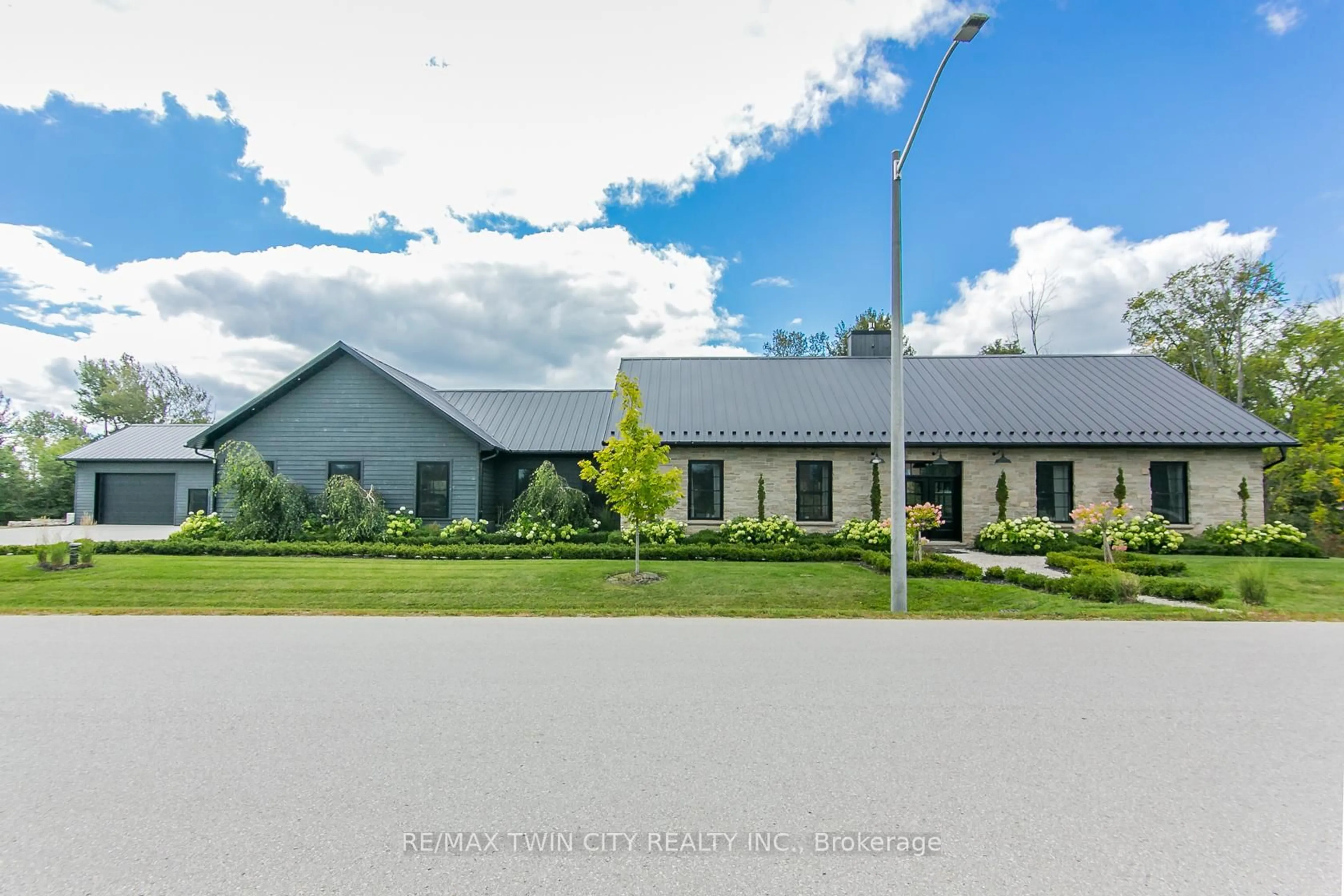 A pic from outside/outdoor area/front of a property/back of a property/a pic from drone, unknown for 141 Ruth Anne Pl, Mapleton Ontario N0G 2K0