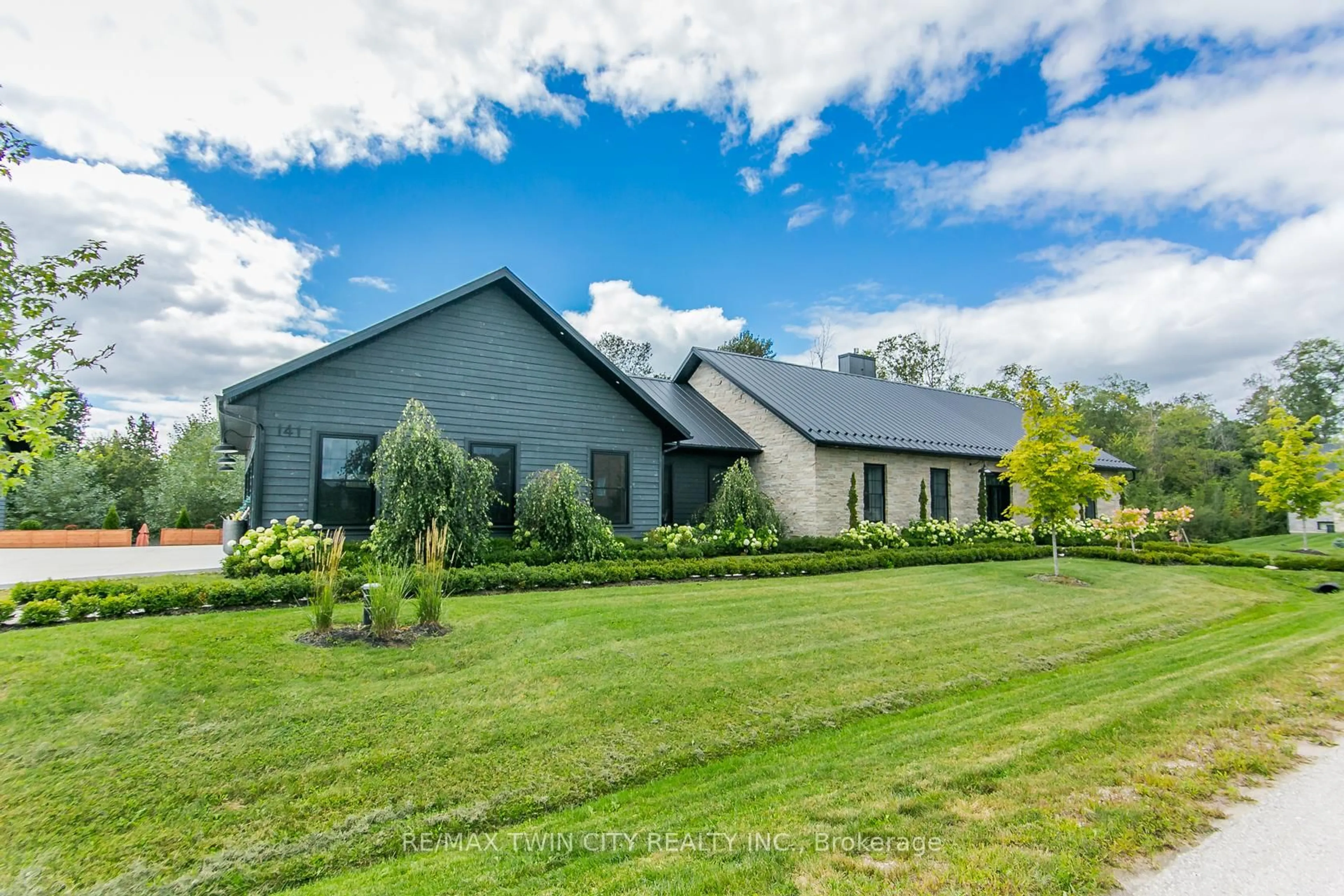 A pic from outside/outdoor area/front of a property/back of a property/a pic from drone, unknown for 141 Ruth Anne Pl, Mapleton Ontario N0G 2K0