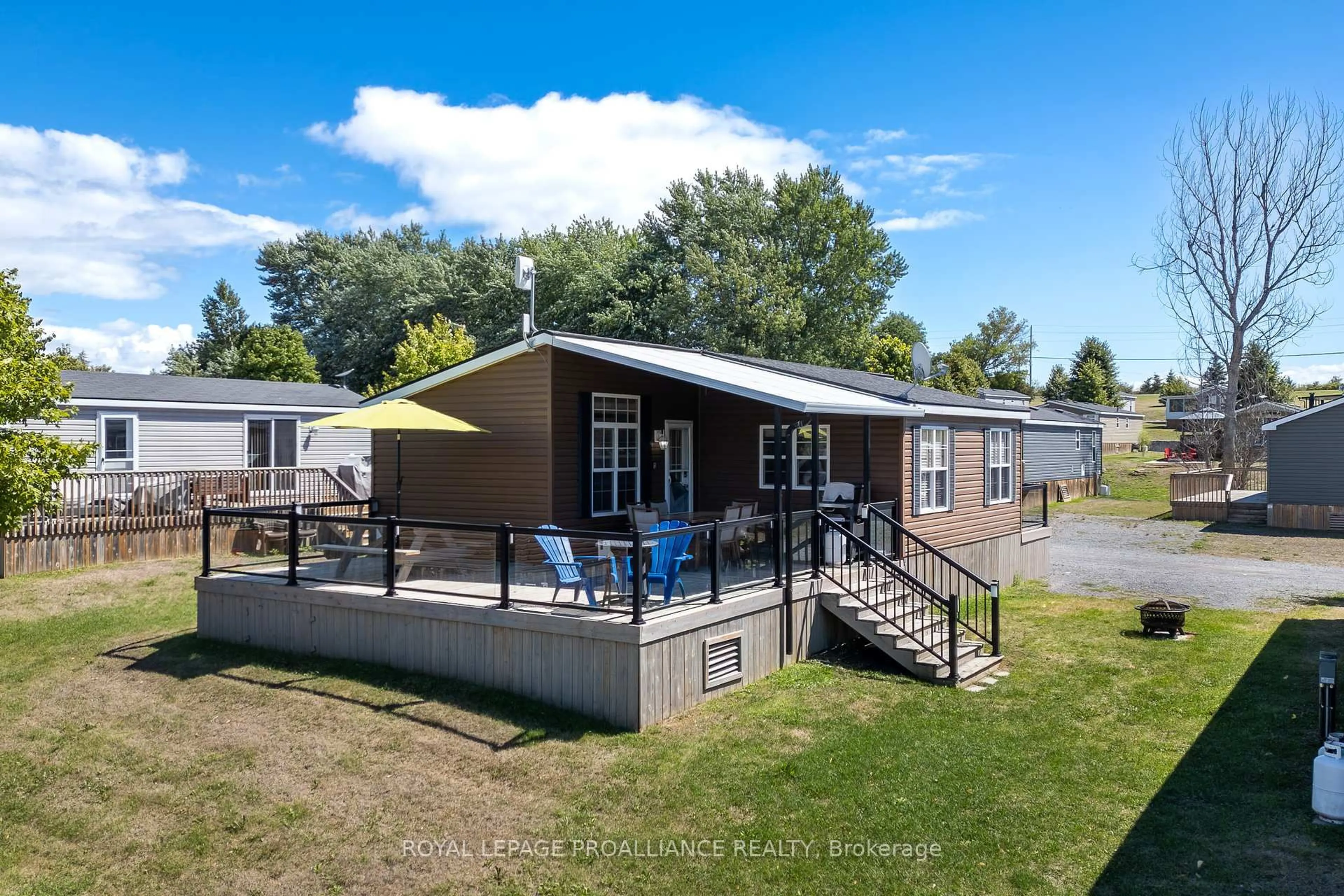 A pic from outside/outdoor area/front of a property/back of a property/a pic from drone, unknown for 486 County Rd 18 - 5 Cricket Lane, Prince Edward County Ontario K0K 1P0