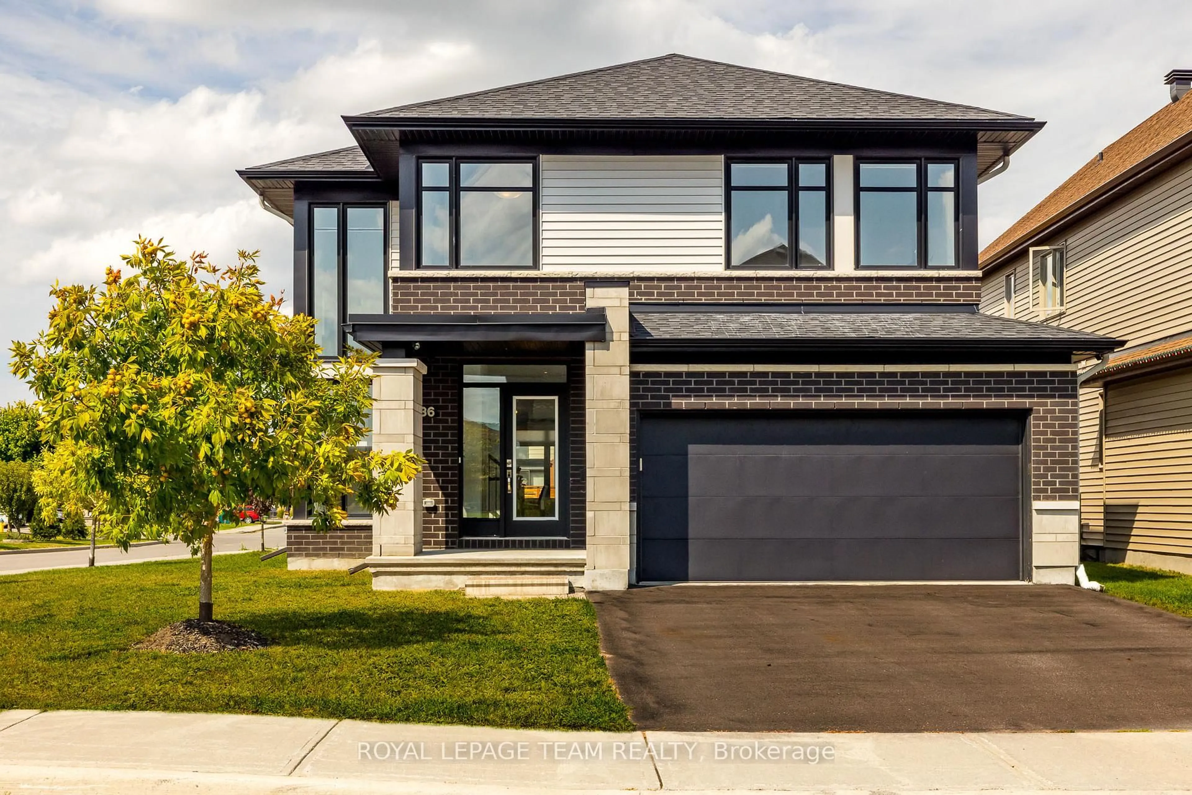 Home with brick exterior material, street for 636 MISTWELL Lane, Ottawa Ontario K4M 1B2