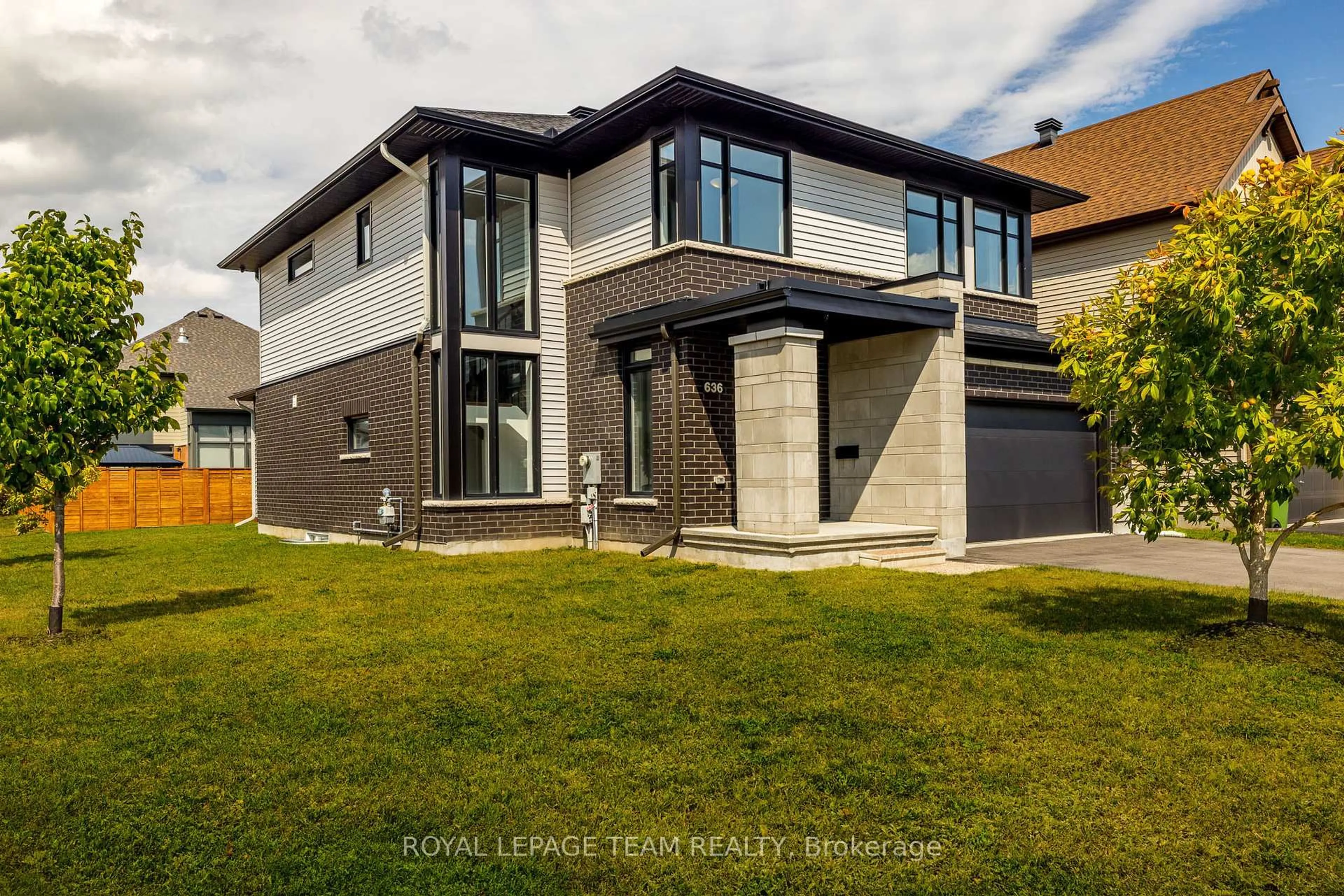 Home with brick exterior material, street for 636 MISTWELL Lane, Ottawa Ontario K4M 1B2