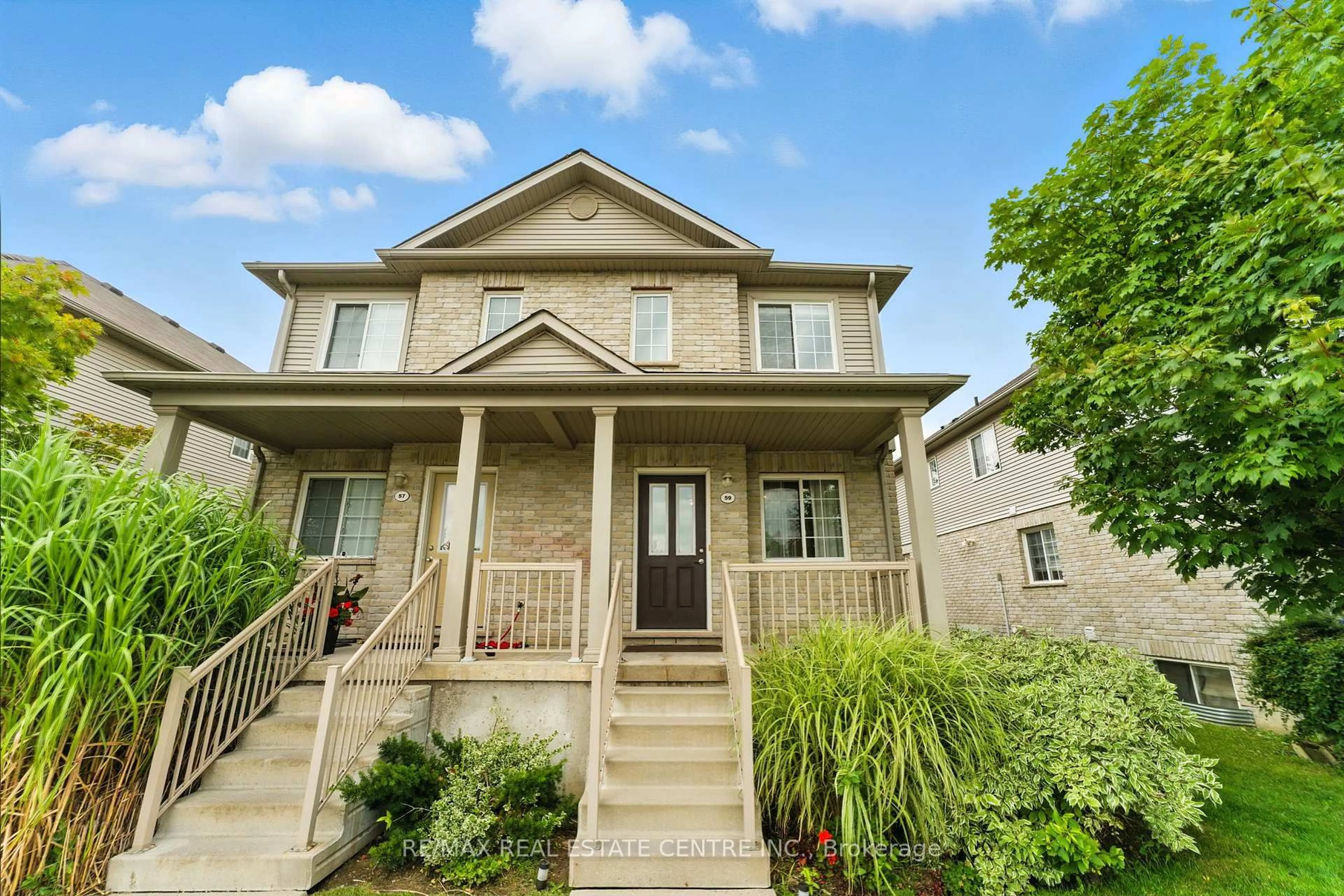 Home with vinyl exterior material, street for 35 Mountford Dr #59, Guelph Ontario N1E 0G6