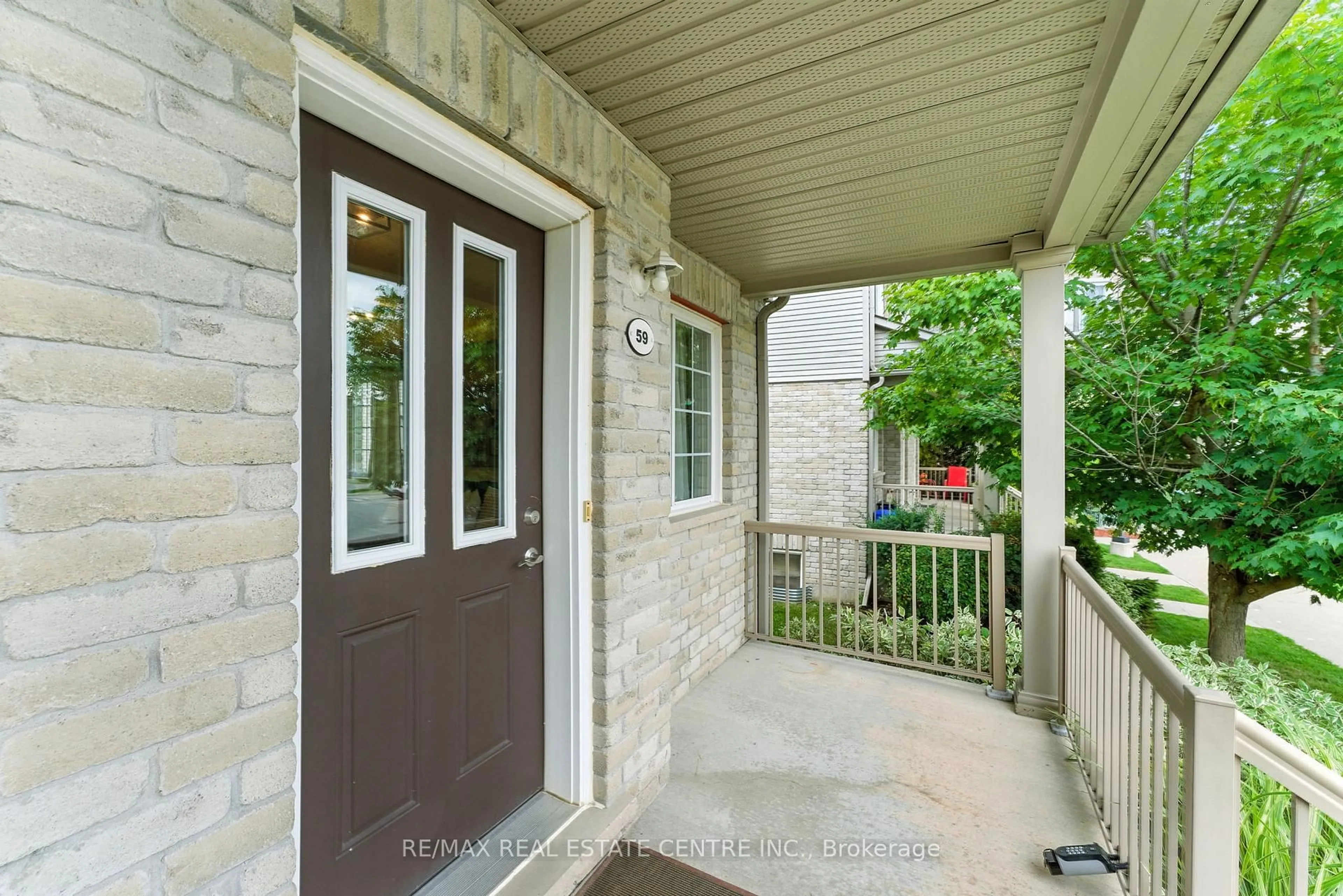 Indoor entryway for 35 Mountford Dr #59, Guelph Ontario N1E 0G6