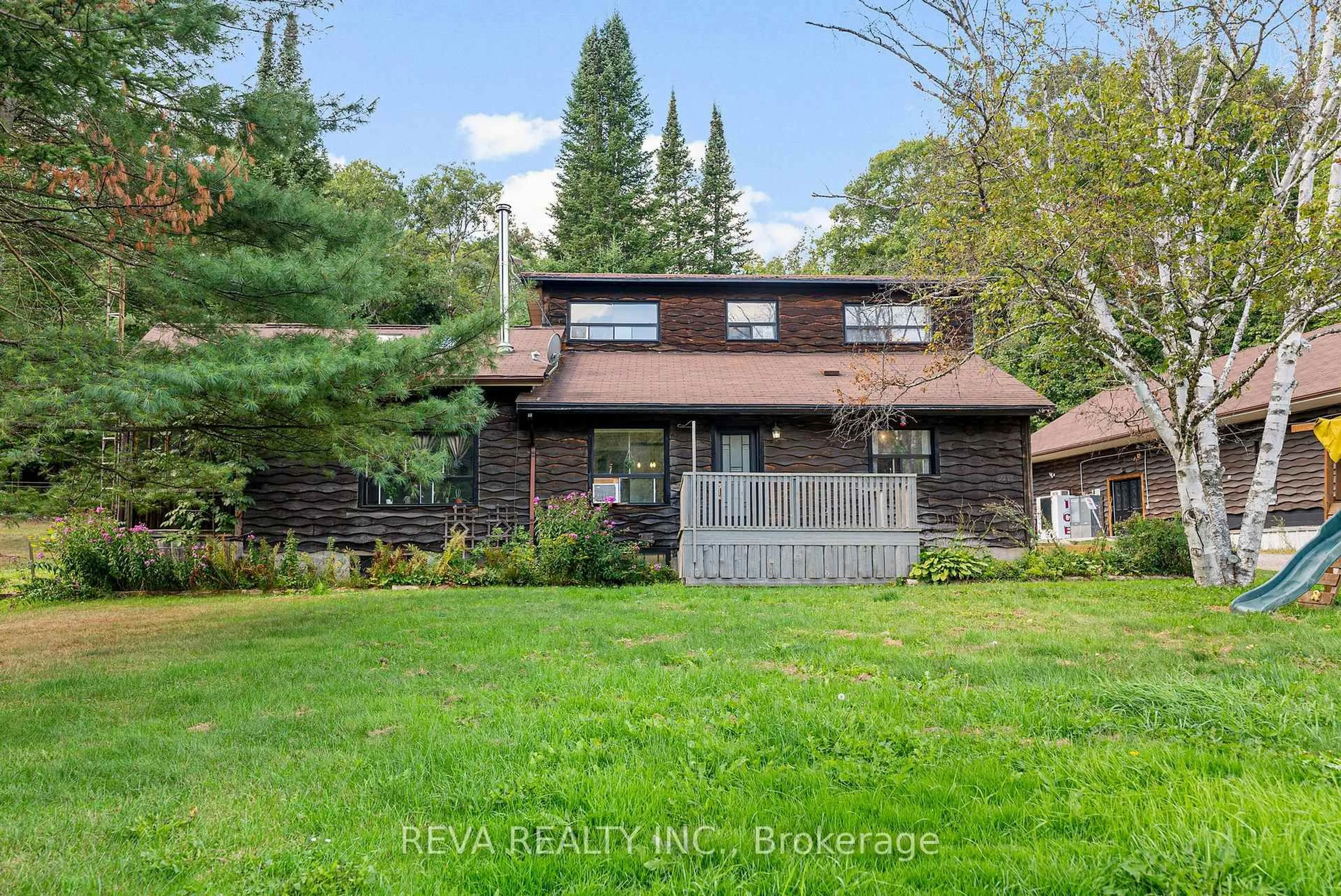 A pic from outside/outdoor area/front of a property/back of a property/a pic from drone, street for 26361 Highway 62 South Highway, Bancroft Ontario K0L 1C0
