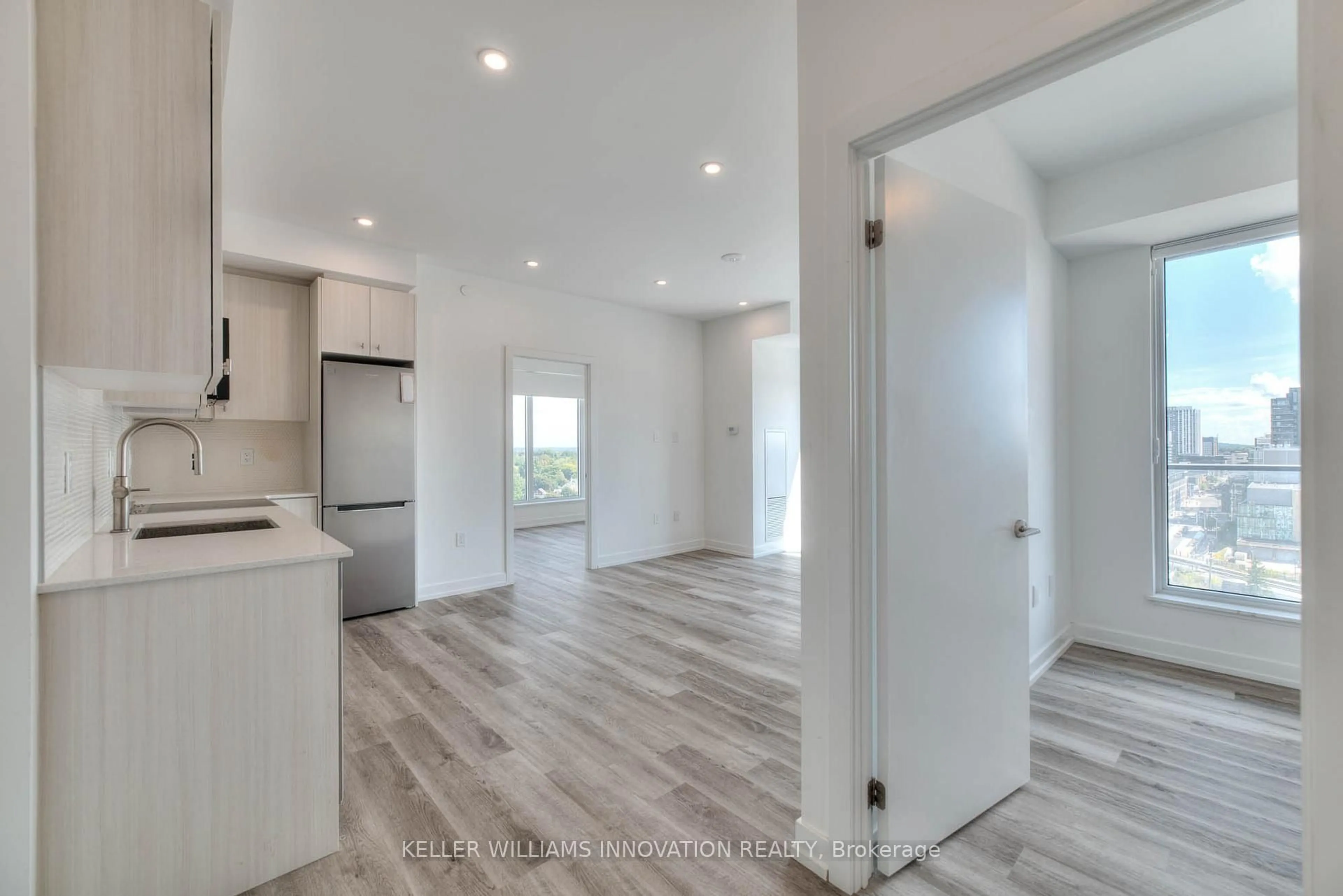 Open concept kitchen, wood/laminate floor for 5 wellington St #1012, Kitchener Ontario N2G 0E3