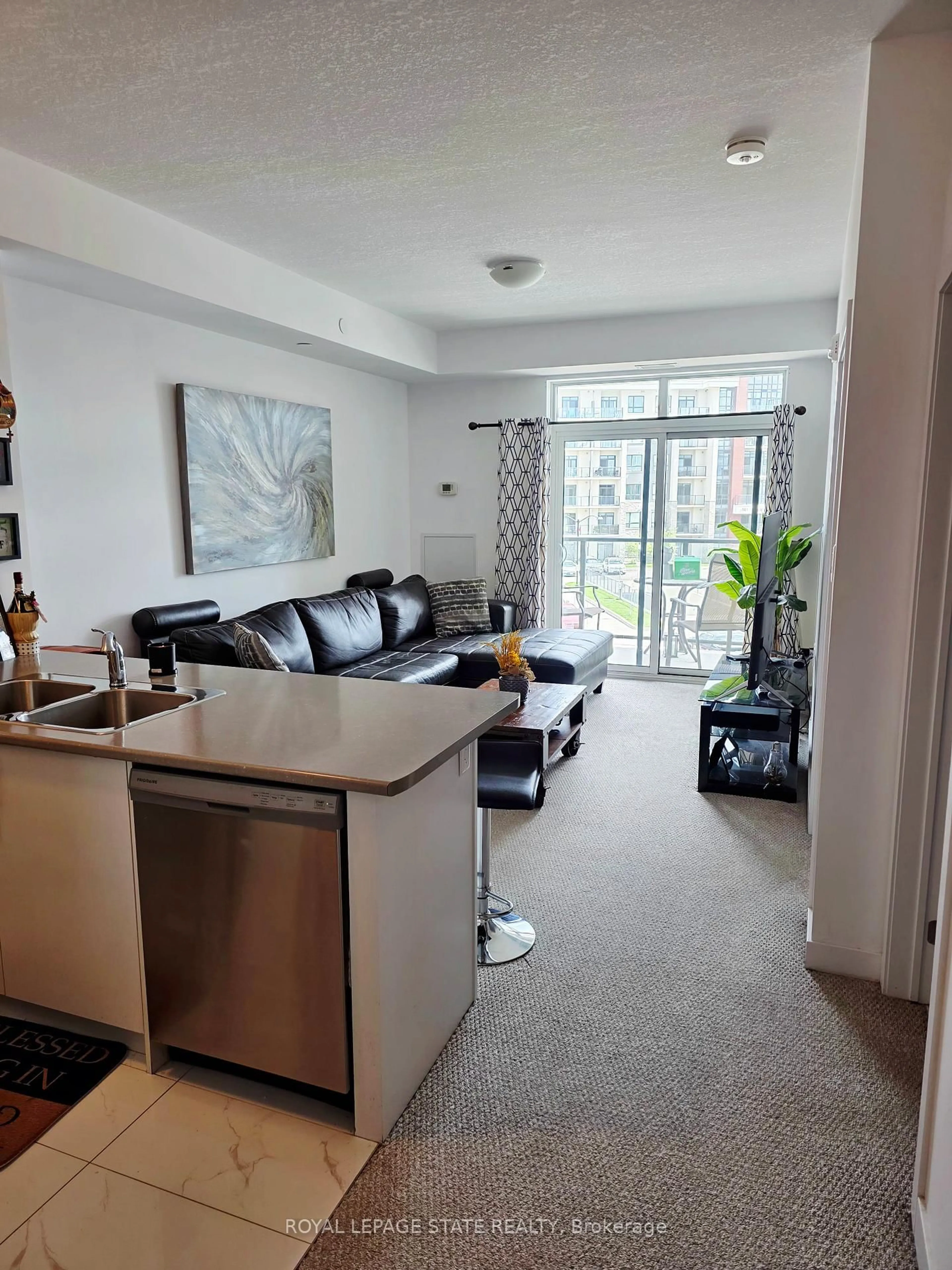 Living room with furniture, unknown for 125 Shoreview Pl #307, Hamilton Ontario L8E 0K3