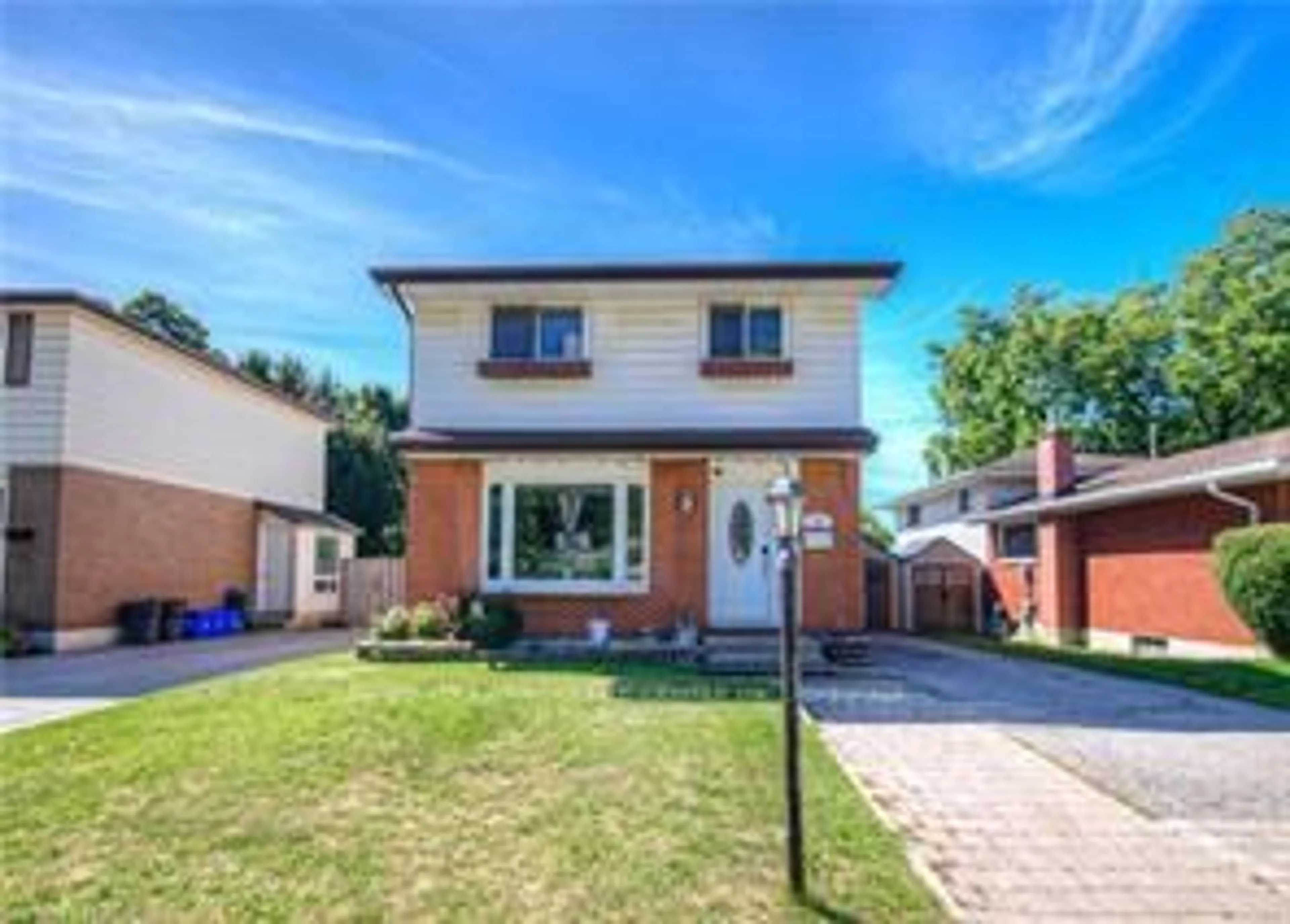 Home with brick exterior material, street for 164 Green Valley Dr, Kitchener Ontario N2P 1C4
