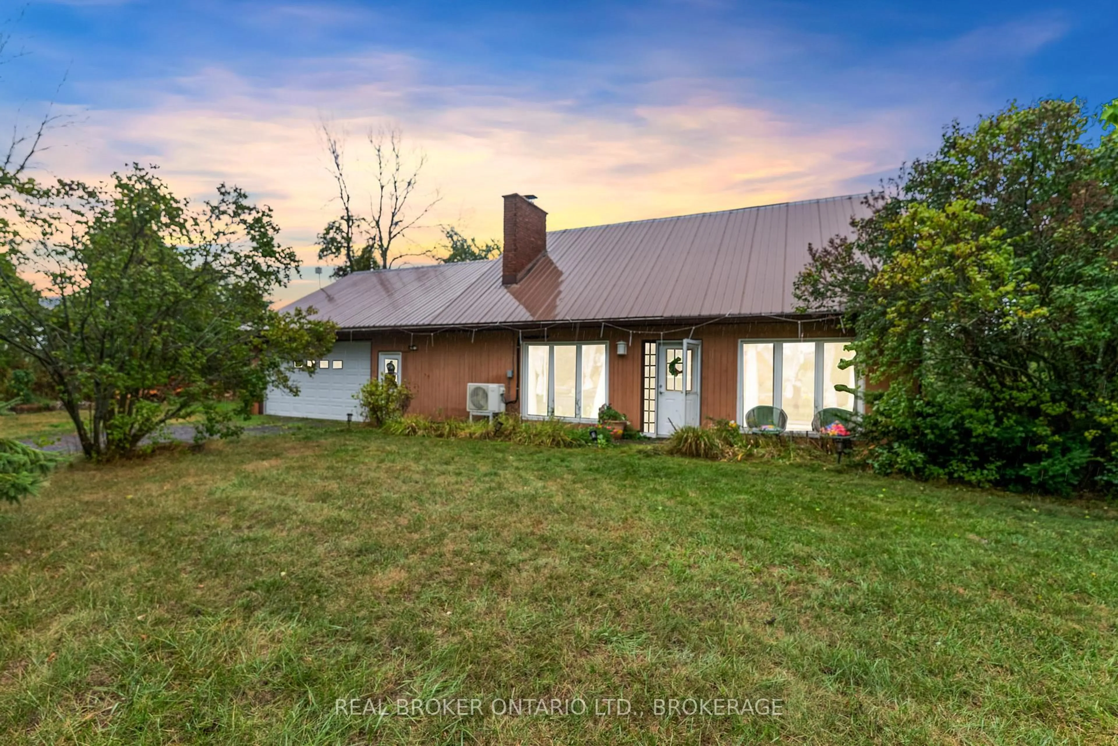 A pic from outside/outdoor area/front of a property/back of a property/a pic from drone, unknown for 2268 Mcintyre Rd, Bath Ontario K0H 1G0