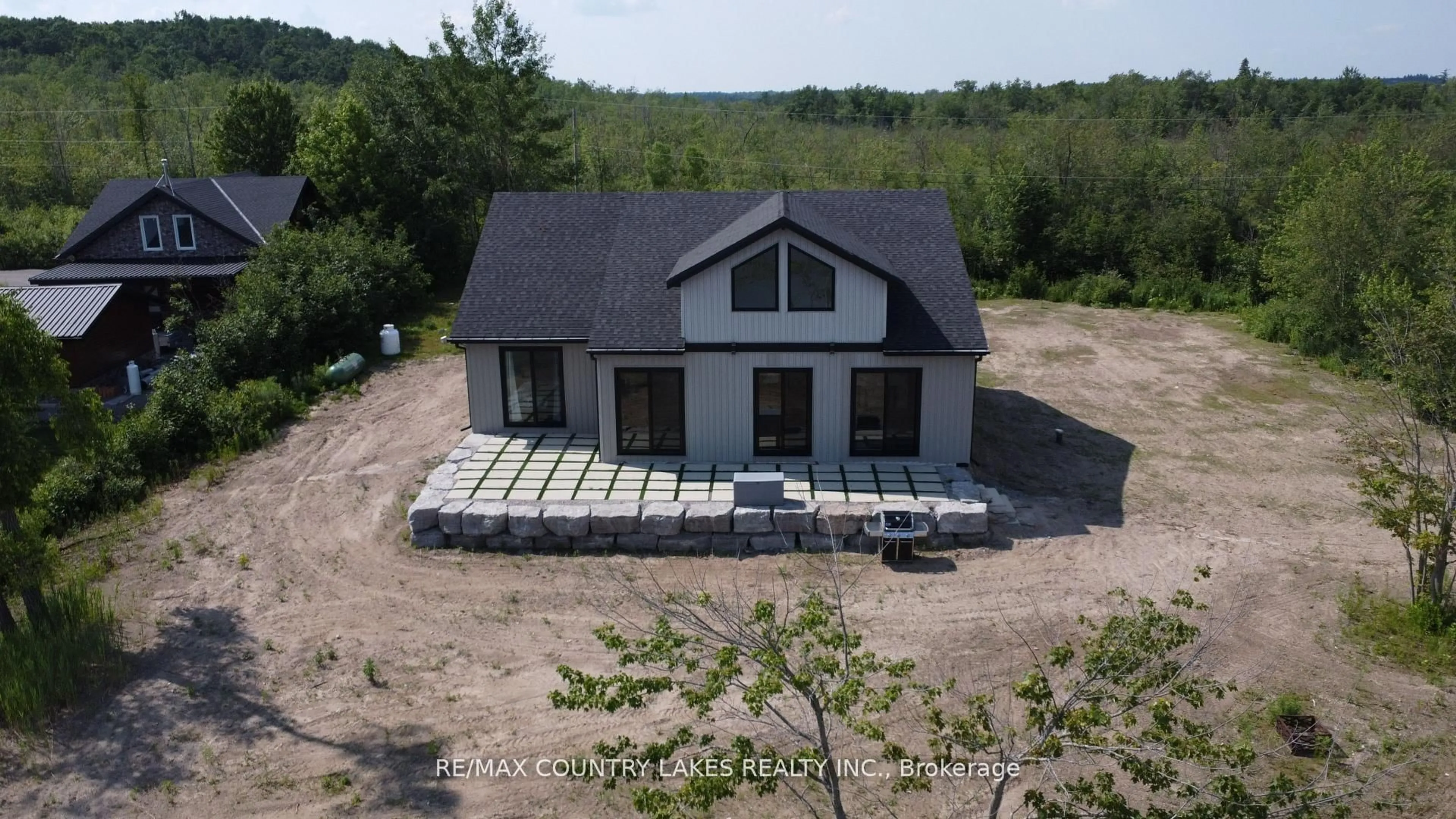 A pic from outside/outdoor area/front of a property/back of a property/a pic from drone, building for 130 Baker Blvd, Kawartha Lakes Ontario K0M 2B0