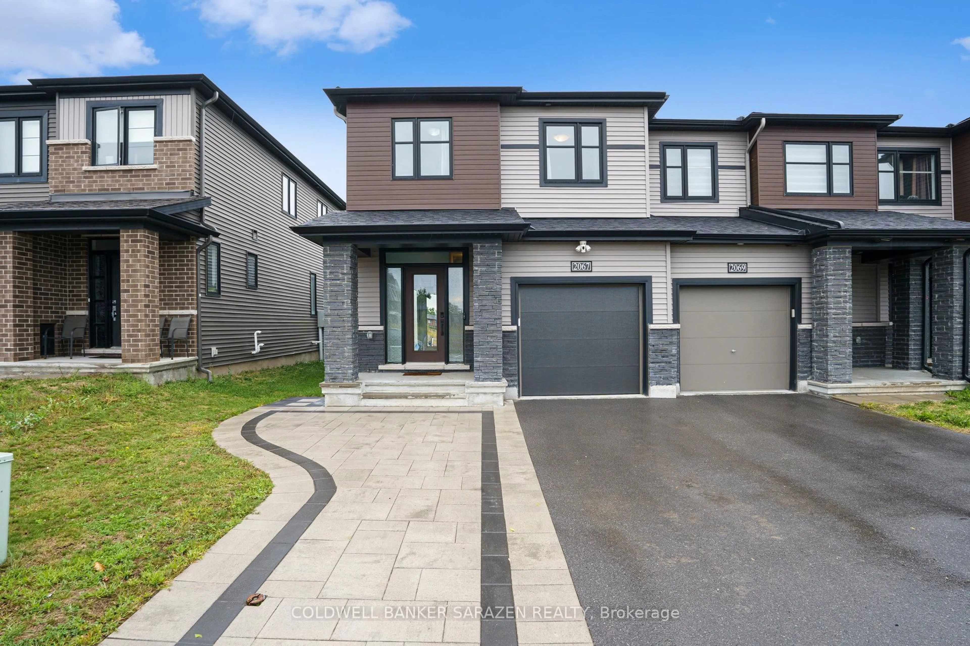 Home with brick exterior material, street for 2067 Caltra Cres, Ottawa Ontario K2J 6V5