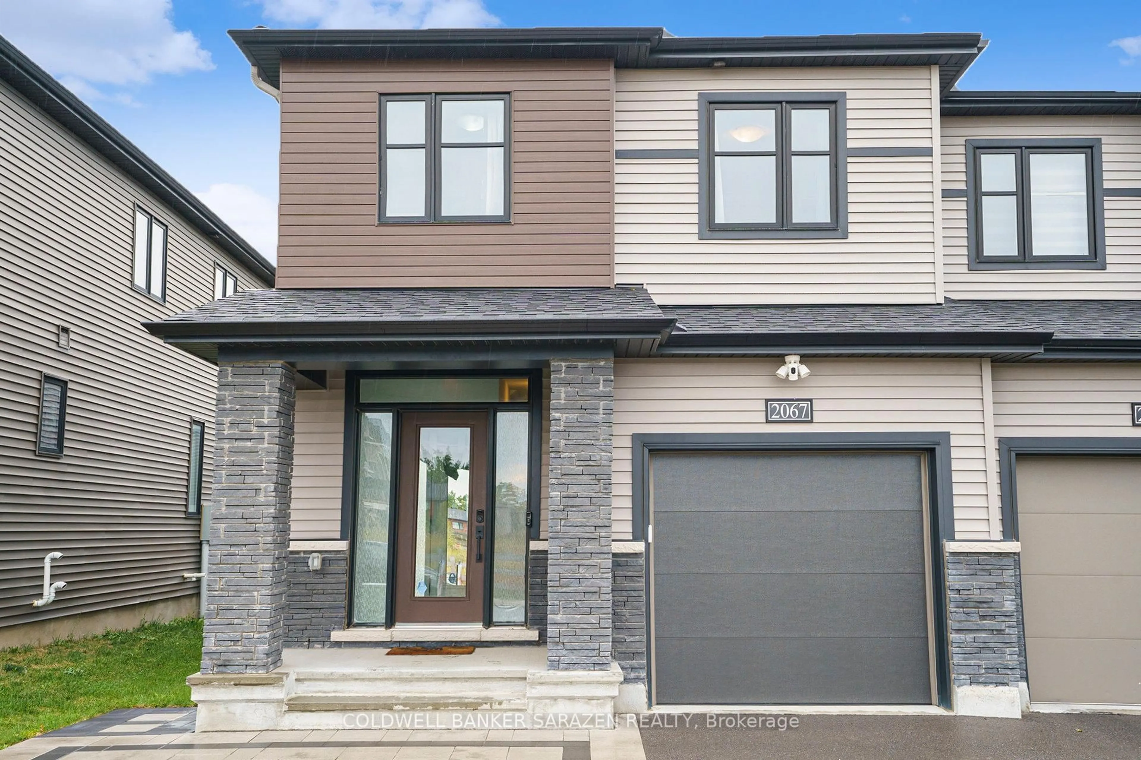 Home with brick exterior material, street for 2067 Caltra Cres, Ottawa Ontario K2J 6V5